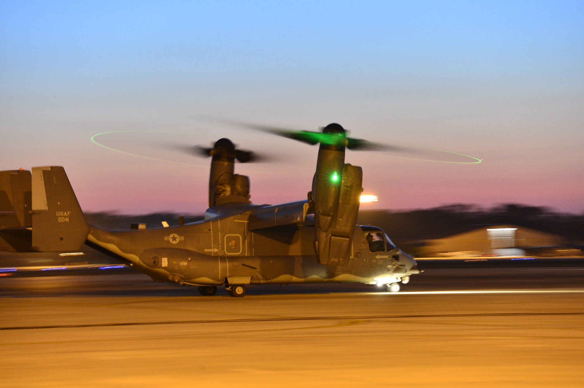 A U.S. Air Force CV-22 Osprey tiltrotor aircraft takes off at Hurlburt Field, Fla., May 3, 2014, during Emerald Warrior 14. Emerald Warrior is a U.S. Special Operations Command-sponsored two-week joint/combined tactical exercise designed to provide realistic military training in an urban setting. (U.S. Air Force photo by Airman 1st Class Jasmonet Jackson)