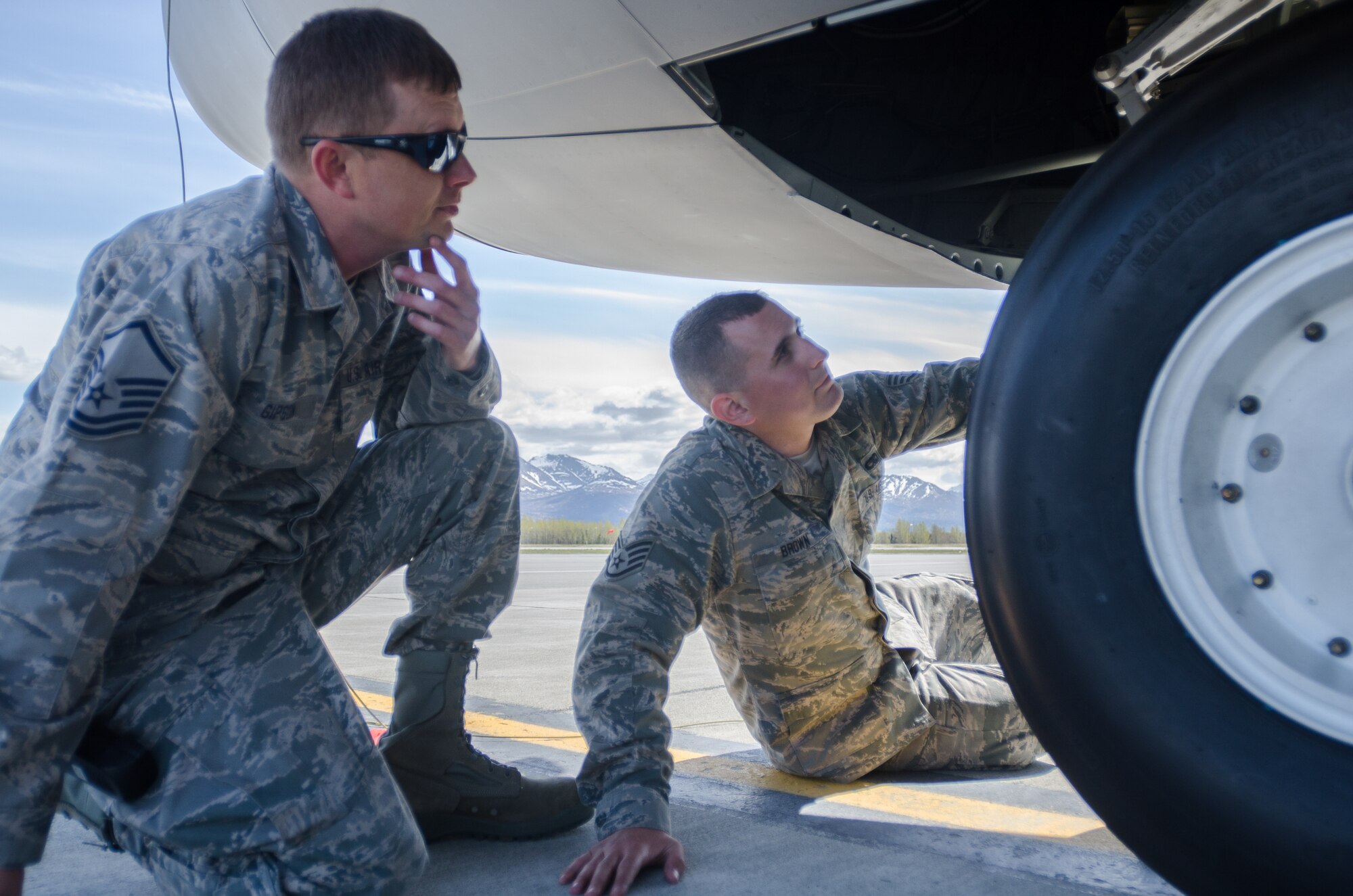 Master Sgt. Lonie Gipson (left), 123rd Aircraft Maintenance Squadron expediter, and Staff Sgt. Eric Brown, crew chief for the 123rd Aircraft Maintenance Squadron, inspect a Kentucky Air National Guard C-130 Hercules prior to flight operations at Joint Base Elmendorf-Richardson, Alaska, on May 8, 2014. More than 100 Airmen from the Kentucky Air National Guard’s 123rd Airlift Wing are currently deployed to participate in Red Flag-Alaska. (U.S. Air National Guard photo by Master Sgt. Phil Speck)