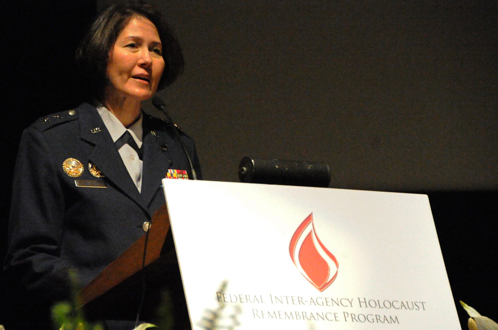 Air Force District of Washington Commander Maj. Gen. Sharon K. G. Dunbar speaks to the audience attending the Federal Inter-Agency Holocaust Remembrance Program "Eyewitness To Evil" at the Lincoln Theater in Washington D.C., May 7, 2014. The program invited Maj. Gen. Dunbar as a keynote speaker as well as survivors of the Holocaust and Bosnian War to share their stories. (U.S. Air Force photo/Staff Sgt. Matt Davis) 