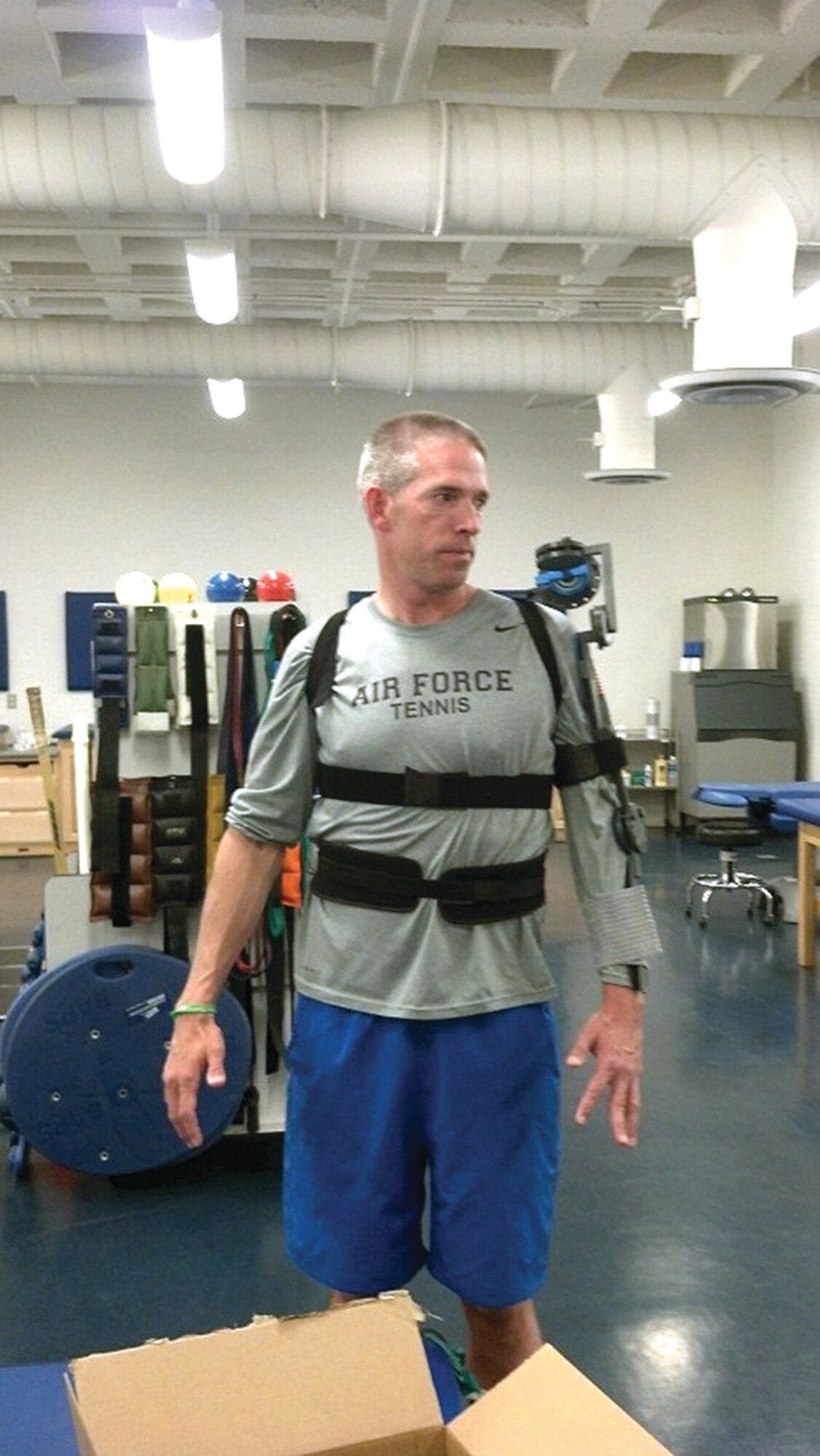 Lt. Col. Dan Oosterhous, Academy men’s tennis coach, suffered two strokes last year. He helped the Neumimic team test the brace and the Kinect program. (Courtesy photo)