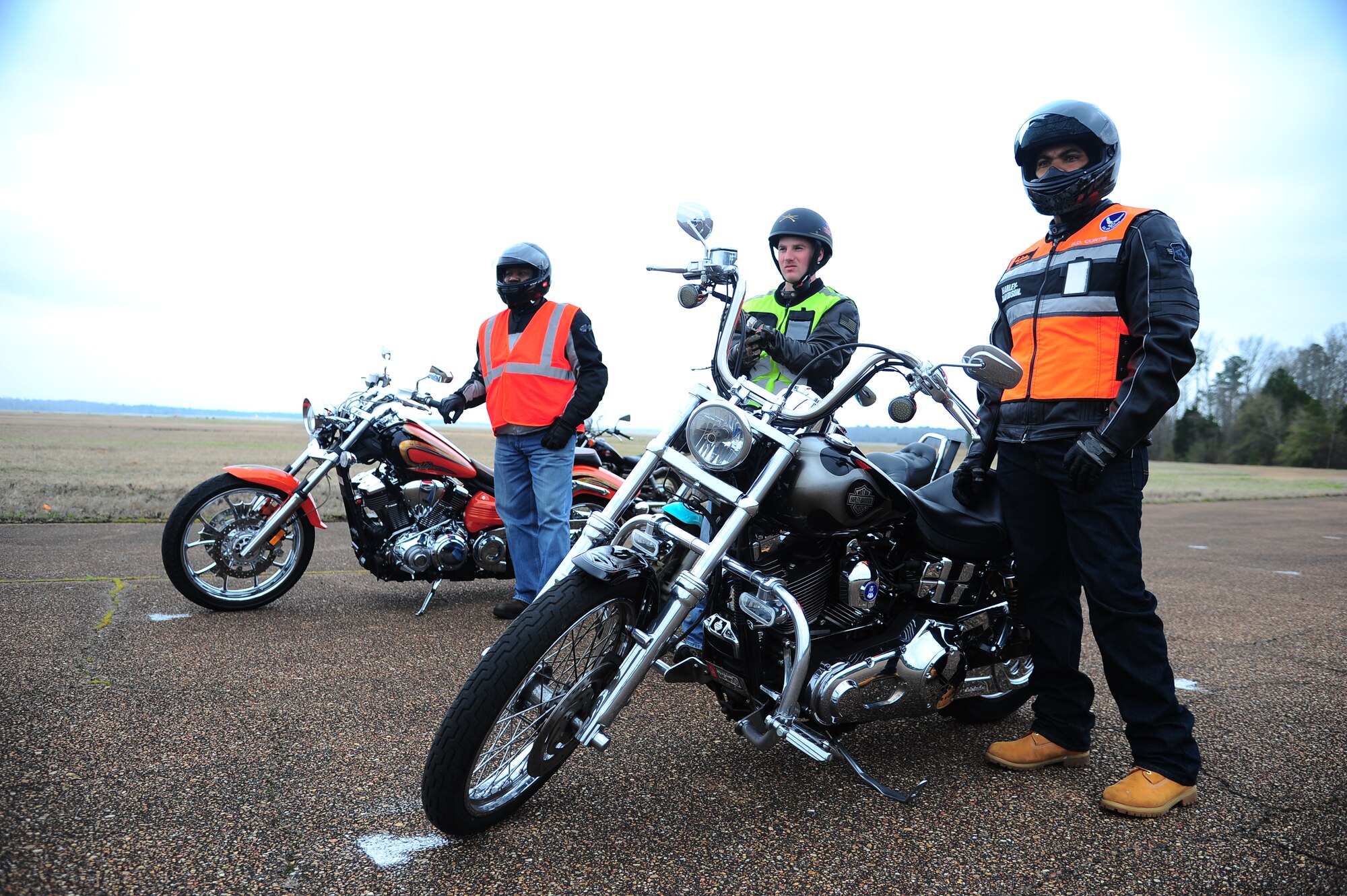 Robert Rogers, 14th Operation Support Squadron, left, Airman 1st Class Daniel Lile, 14th Flying Training Wing Public Affairs, center, and Senior Airman Ramon Curtis, 14th Operation Support Squadron Weather Forecaster, attend Experienced Rider Course at Columbus Air Force Base, Miss. They learned important aspects of motorcycle safety, such as required Personal Protection Equipment, how to safely drive with other motorists and turning techniques. (U.S. Air Force photo/ Airman John Day)