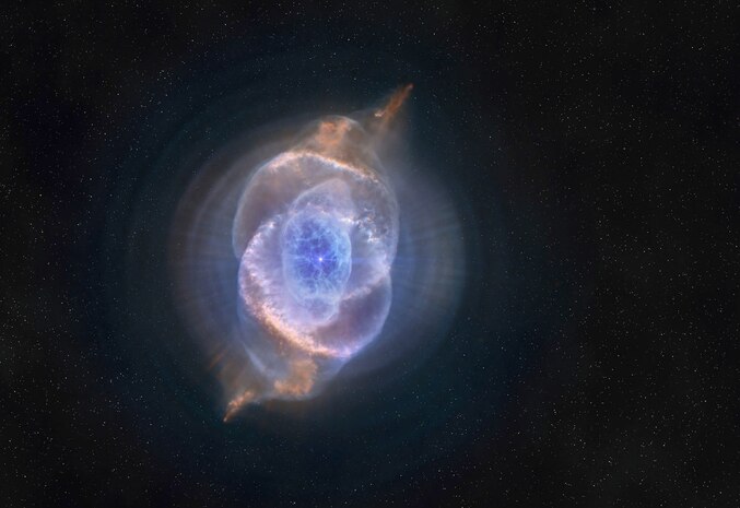 The eerie glow of the Cats Eye Nebula, one of the most structurally complex nebulae known, as seen in "Hidden Universe." [Photo credit: NASA, ESA, HEIC and The Hubble Heritage Team (STScI/AURA)]