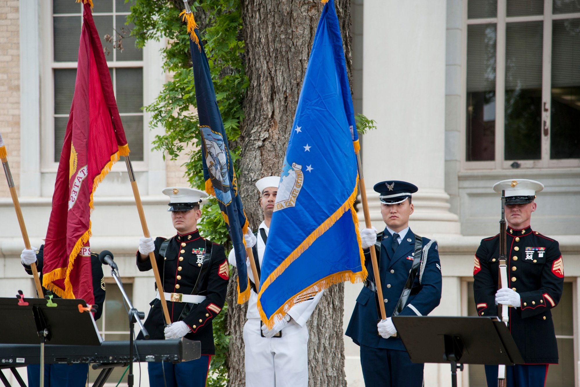 SAN ANGELO, Texas-- Airman 1st Class Aziz N. Sarbashev, 17th Force Support Squadron personnel technician, posts the colors during the National Day of Prayer event at the Tom Green County Courthouse here April 29. Sarbashev has been a member of the honor guard since 2013 and earned the 17th Training Wing Honor Guard member of the year award for 2013. (U.S. Air Force photo/ Senior Airman Michael Smith)