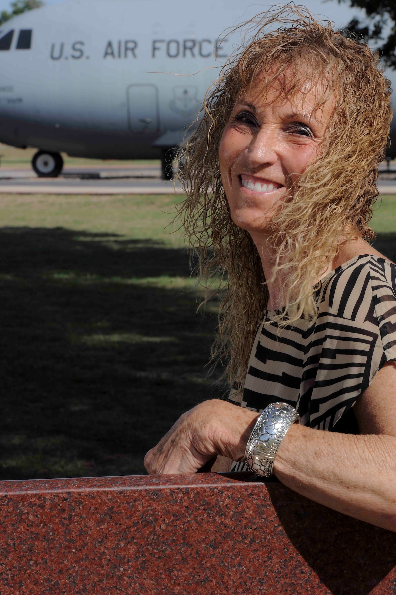 ALTUS AIR FORCE BASE, Okla. – Carol Robinson, 97th Force Support Squadron manpower analyst, has dedicated 40 years to U.S. Air Force civil service at Altus AFB. She began with the 97th Civil Engineer Squadron as a data transcriber April 22, 1974 and has since moved to the 97th FSS. (U.S. Air Force photo by Senior Airman Jesse Lopez/Released)
