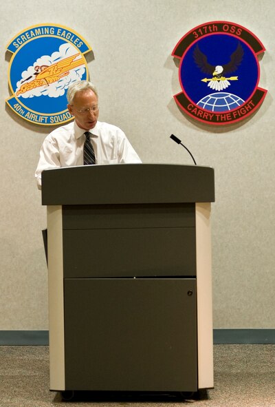 Dr. David Itkin, Abilene Philharmonic Orchestra conductor, speaks during a leadership and innovation forum held May 5, 2014, at Dyess Air Force Base, Texas. Itkin was the guest speaker for the event. In his presentation, Itkin explained that the hierarchy structure of an orchestra is broken down into four sections. Each section has a leader who is responsible for translating the conductor’s instructions in more detail to the other musicians in their section. Itkin said this process saves time and money, because the conductor does not have to inspect each individual’s work. (U.S. Air Force photo by Airman 1st Class Autumn Velez/Released)