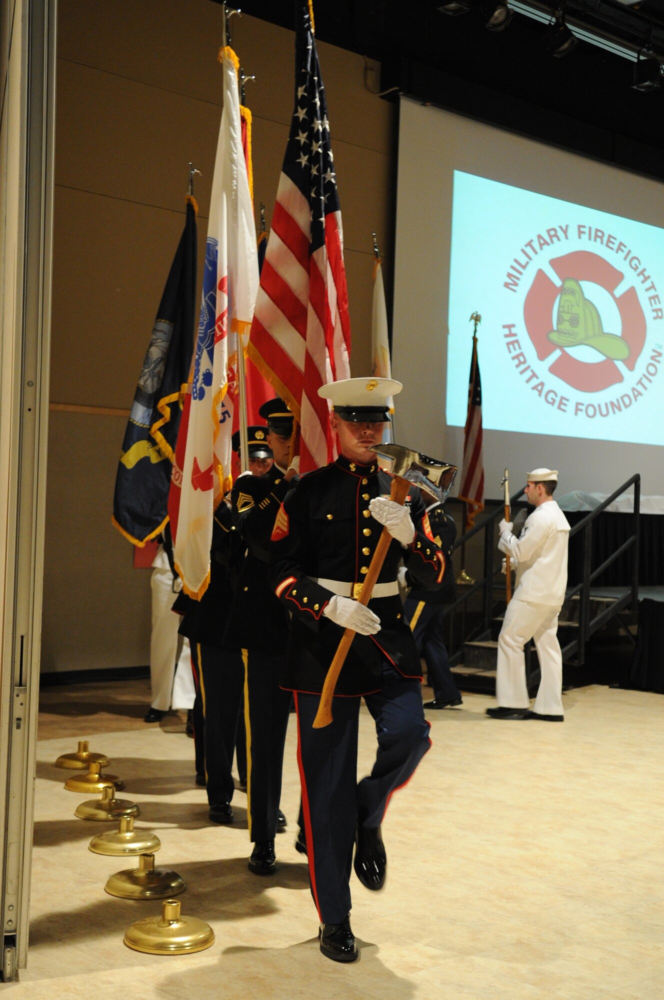 SAN ANGELO, Texas -- The Department of Defense Fire Academy Joint Service Color Guard posts the colors during the Military Firefighter Heritage Foundation’s Annual Firefighter Muster at the McNease Convention Center here May 3. The Military Firefighter Heritage Foundation hosted the muster to honor firefighters past and present. (U.S. Air Force photo/ Staff Sgt. Laura R. McFarlane)