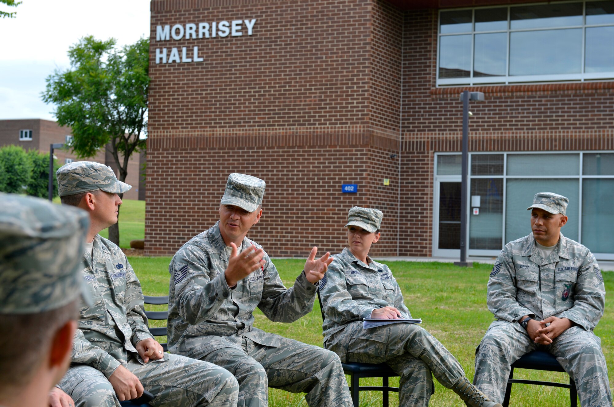 MCGHEE TYSON AIR NATIONAL GUARD BASE, Tenn. - Tech. Sgt. Donald O. Noel, instructor talking, discusses social media do's and don't's in the military to NCO Academy Class 14-5, B-flight, on the I.G. Brown Training and Education Center campus here, May 9, 2014. (U.S. Air National Guard photo by Master Sgt. Kurt Skoglund/Released)