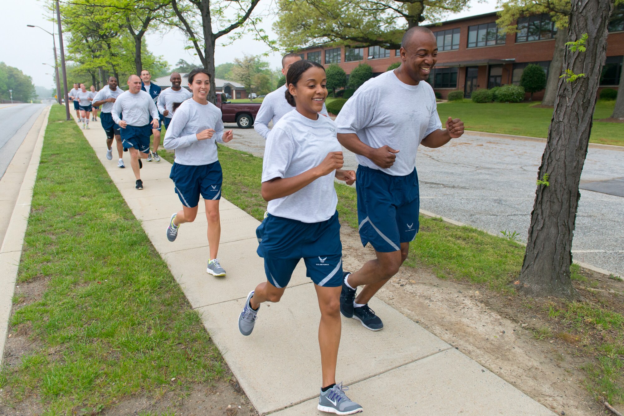 Air Guardsmen from the Air National Guard Readiness Center, Joint Base Andrews, Md., participate in a 2-mile fun run before an Enlisted Call May 9, 2014. The theme of the Enlisted Call; "Renewing or Committment to the Profession of Arms", . (U.S. Air National Guard photo by Master Sgt. Marvin R. Preston/Released)