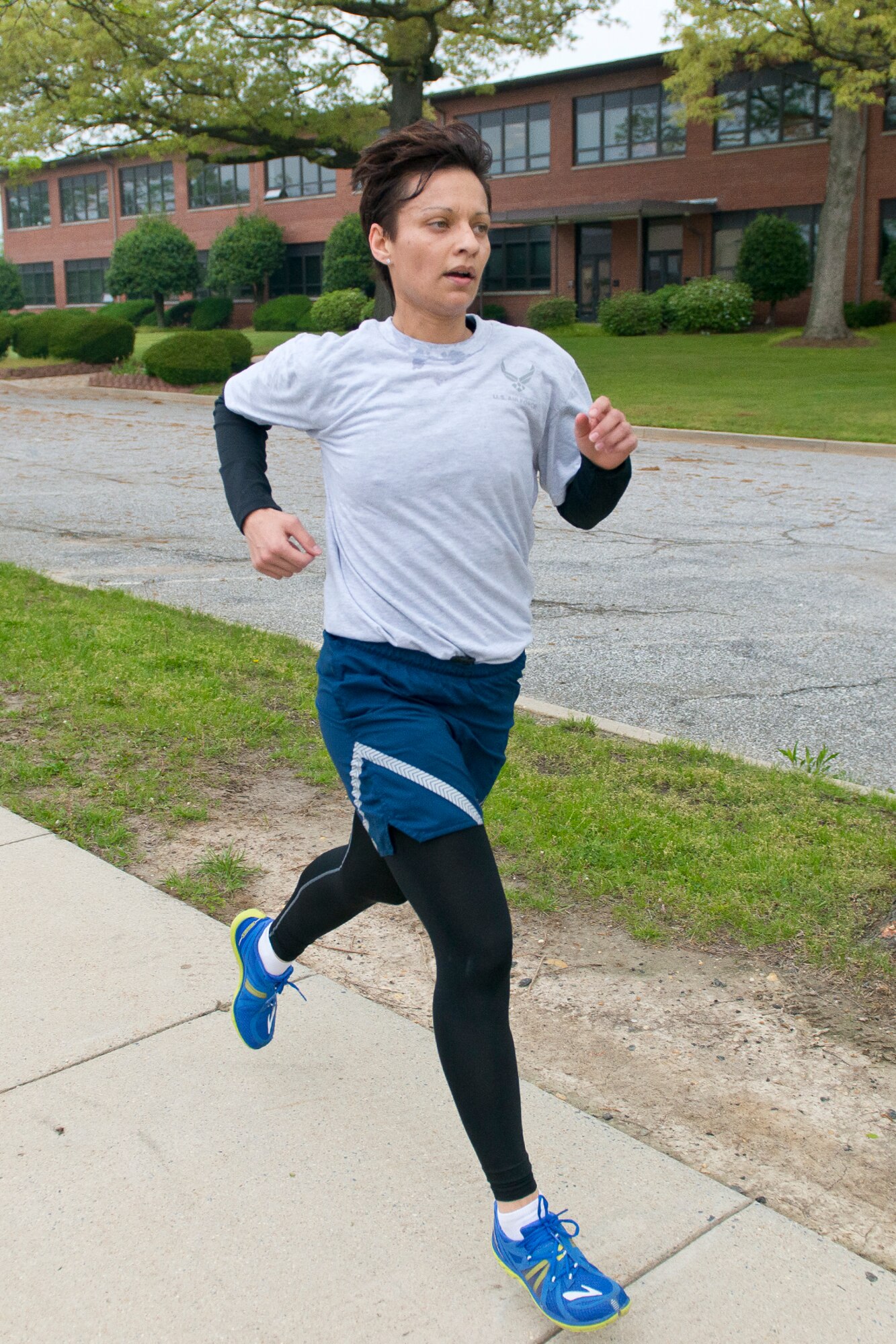 Air Guardsmen from the Air National Guard Readiness Center, Joint Base Andrews, Md., participate in a 2-mile fun run before an Enlisted Call May 9, 2014. The theme of the Enlisted Call; "Renewing or Committment to the Profession of Arms", . (U.S. Air National Guard photo by Master Sgt. Marvin R. Preston/Released)