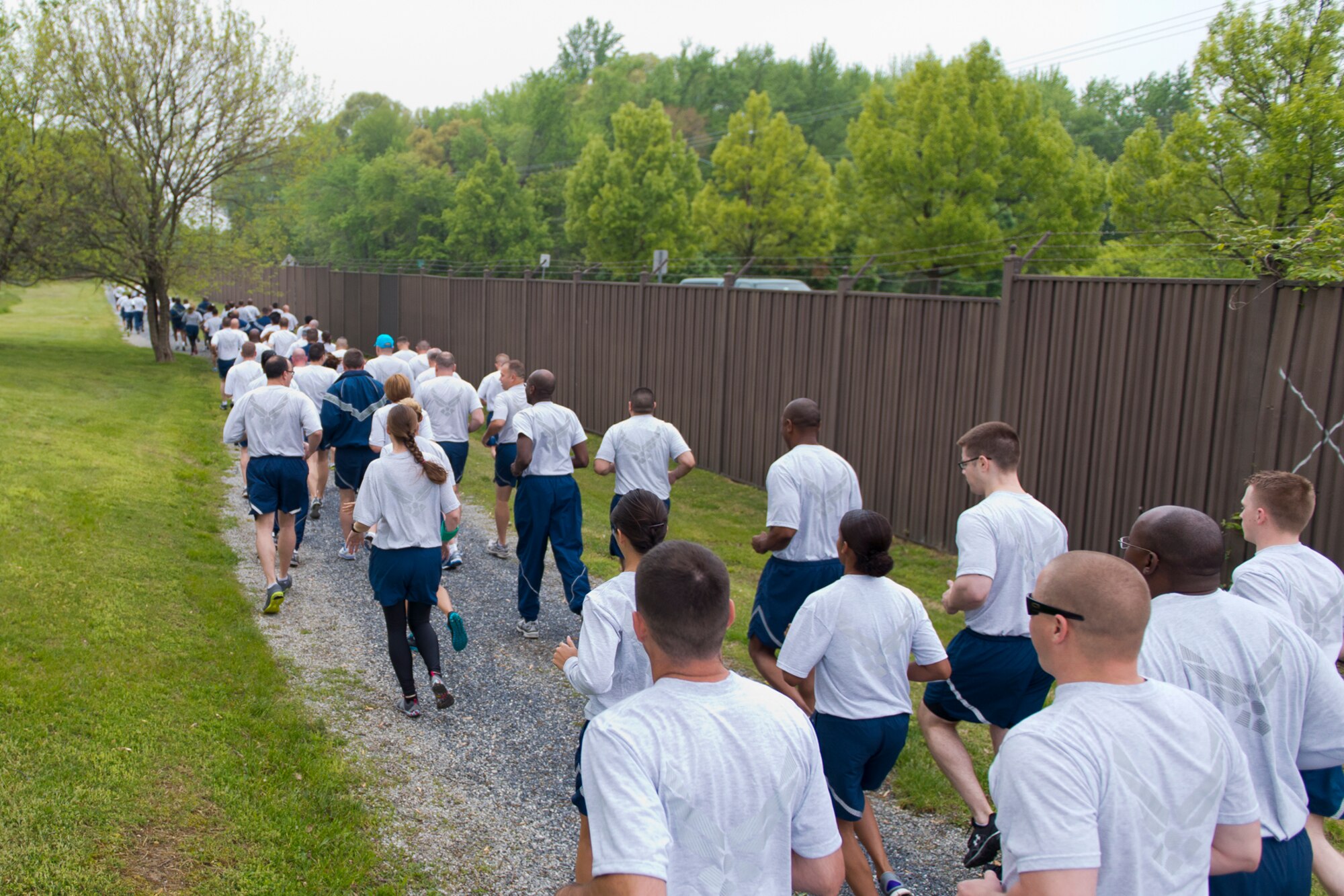 Air Guardsmen from the Air National Guard Readiness Center, Joint Base Andrews, Md., participate in a 2-mile fun run before an Enlisted Call May 9, 2014. The theme of the Enlisted Call; "Renewing or Committment to the Profession of Arms", . (U.S. Air National Guard photo by Master Sgt. Marvin R. Preston/Released)