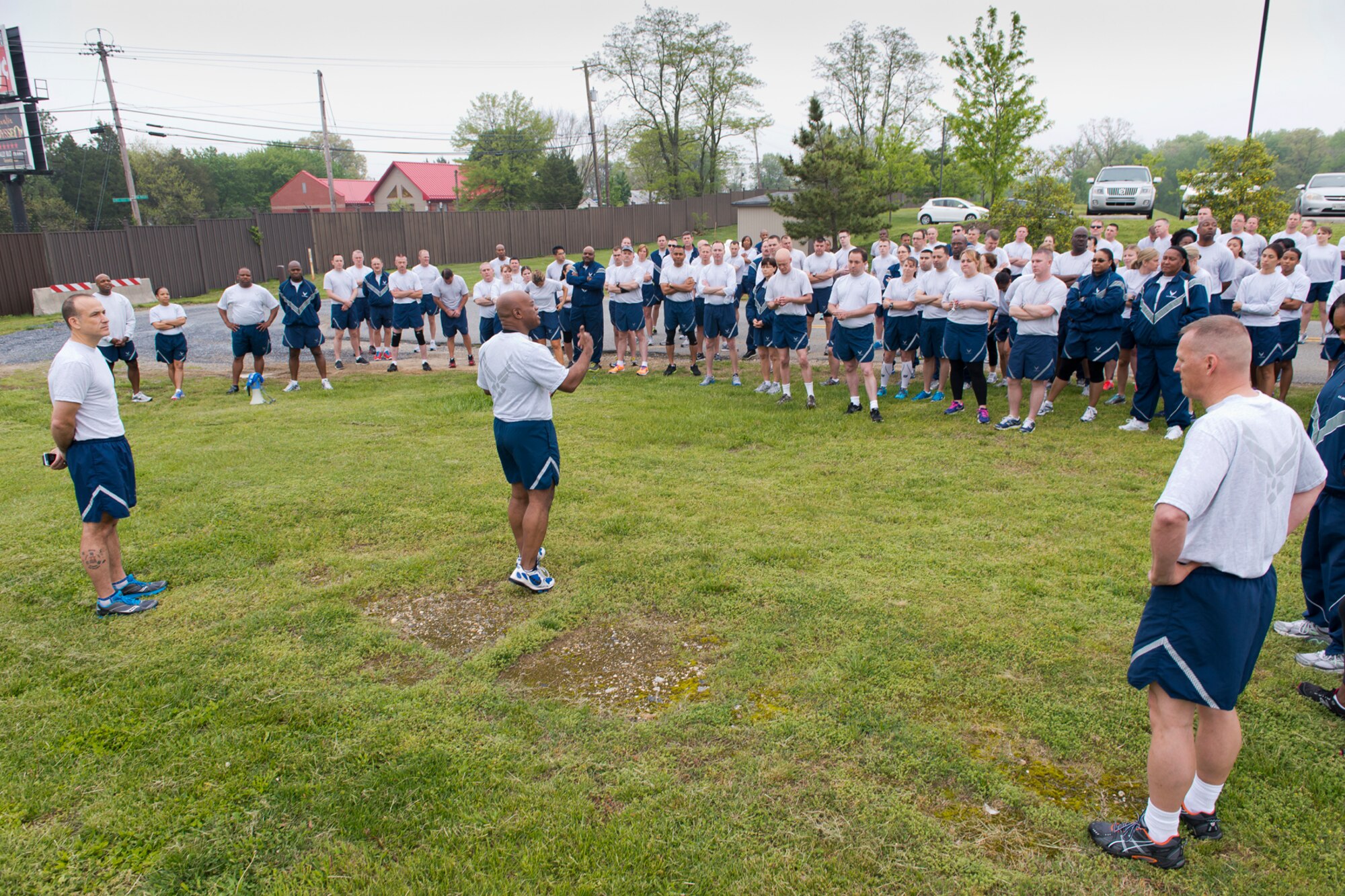 Air Guardsmen from the Air National Guard Readiness Center, Joint Base Andrews, Md., participate in a 2-mile fun run before an Enlisted Call May 9, 2014. The theme of the Enlisted Call; "Renewing or Committment to the Profession of Arms", . (U.S. Air National Guard photo by Master Sgt. Marvin R. Preston/Released)