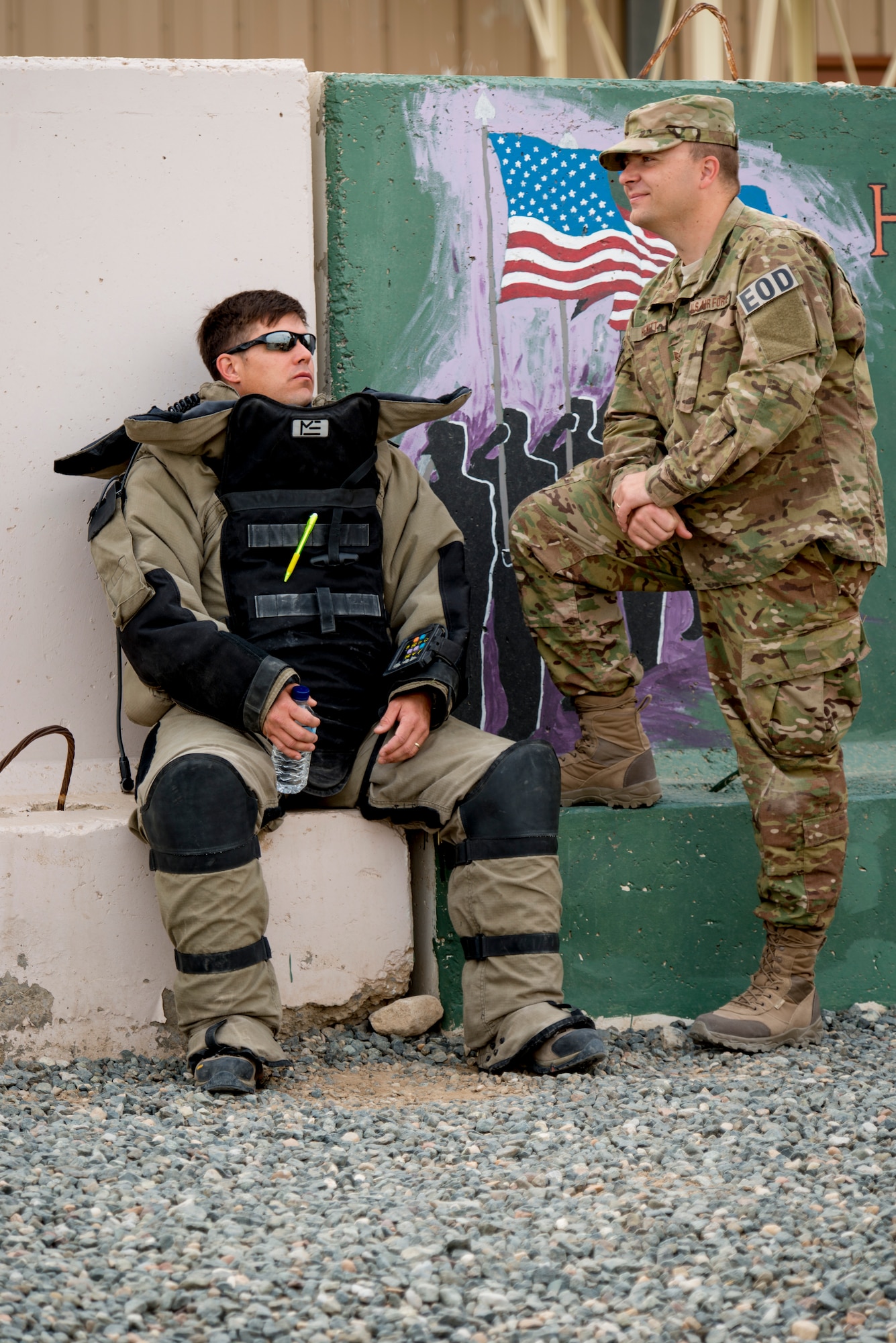 Military members of the 386th Air Expeditionary Wing show their support during a National Explosive Ordnance Disposal Day 5K run May 3, 2014 at an undisclosed location in Southwest Asia. The run memorialized EOD members from the different services who have paid the ultimate sacrifice in the defense of America. (U.S. Air Force photo by Staff Sgt. Jeremy Bowcock)
