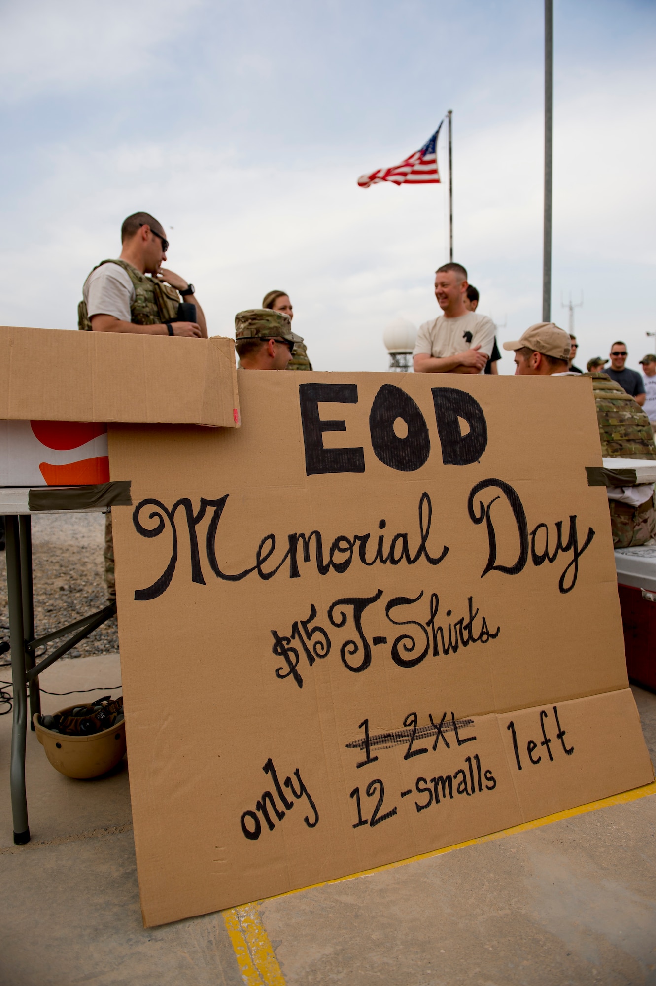 Military members of the 386th Air Expeditionary Wing show their support during a National Explosive Ordnance Disposal Day 5K run May 3, 2014 at an undisclosed location in Southwest Asia. The run memorialized EOD members from the different services who have paid the ultimate sacrifice in the defense of America. (U.S. Air Force photo by Staff Sgt. Jeremy Bowcock)