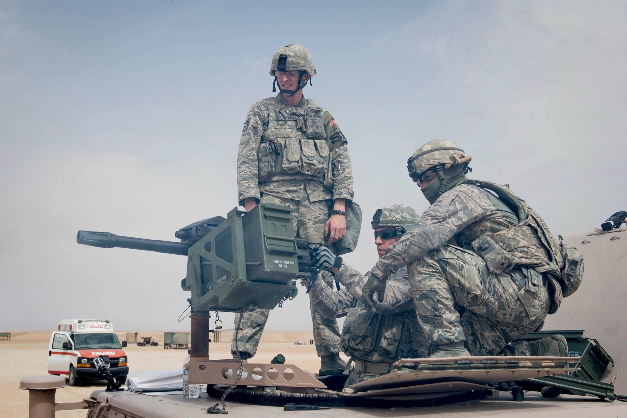 U.S. Air Force Tech. Sgt. Nathan Hardin, 386th Expeditionary Security Forces Squadron, fires a Mark 19 40mm grenade machine gun on May 7, 2014 at an undisclosed location in Southwest Asia. Hardin is deployed from the 150th Security Forces Squadron at Kirtland Air Force Base, N.M. Qualified Security Forces members practice shooting about every two months to maintain proficiency with the weapon system. (U.S. Air Force photo by Staff Sgt. Jeremy Bowcock)