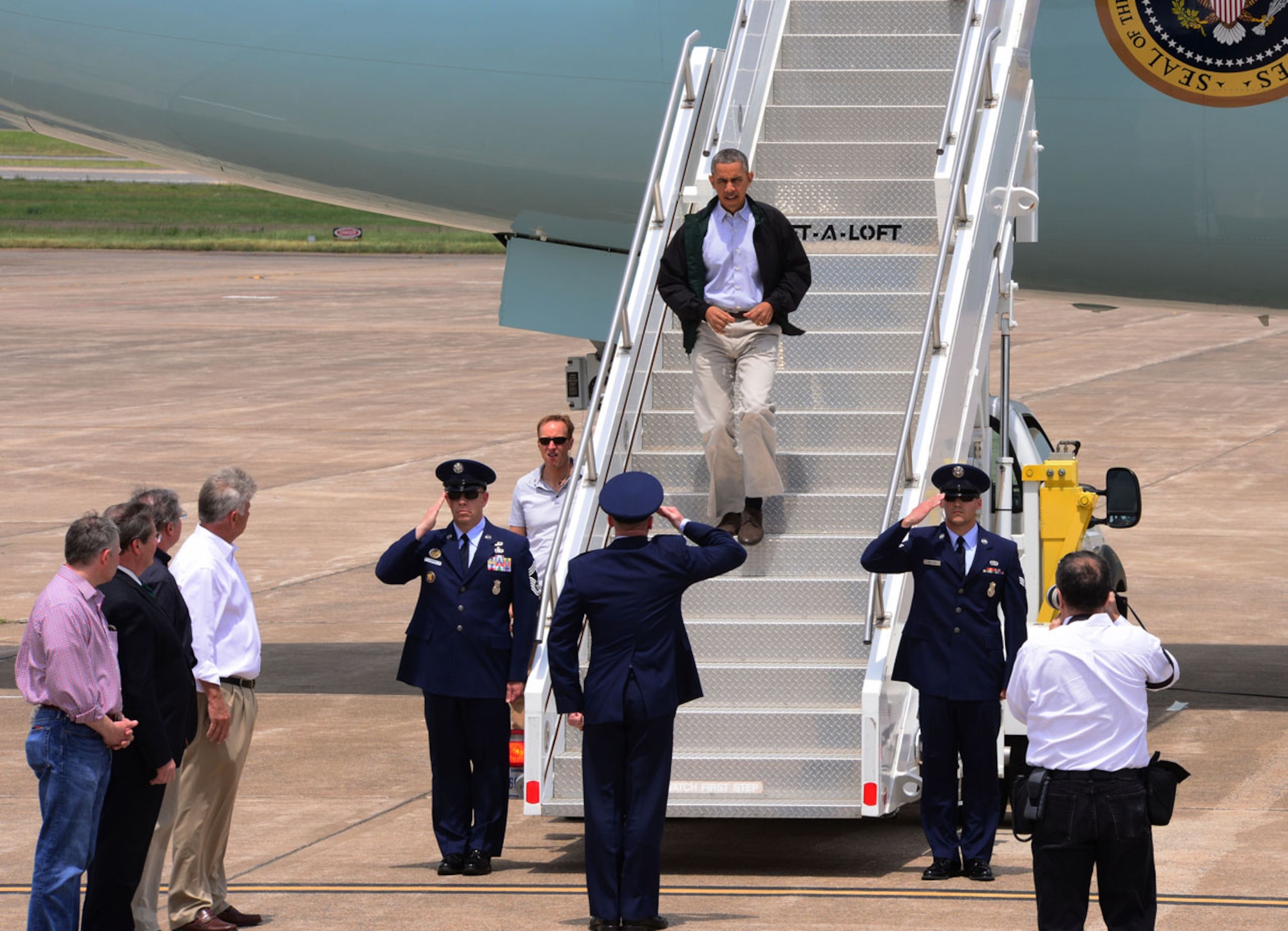 President Barack Obama steps down from Air Force One May 7, 2014, at Little Rock Air Force Base, Ark. President Obama visited with victims, local officials and emergency responders in Vilonia who were affected by a tornado on April 27. (U.S. Air Force photo/ Master Sgt. Chris A. Durney)

