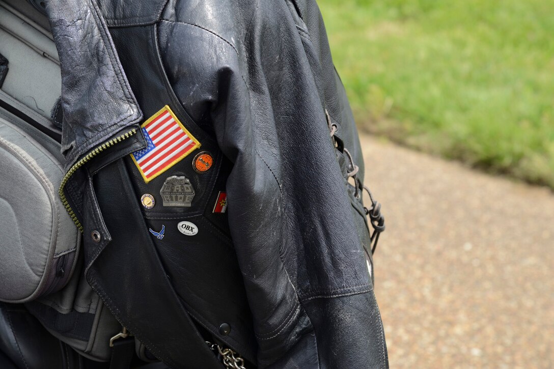 A U.S. Air Force Airman's jacket hangs on the seat of his motorcycle during the Standing Together Against Rape Road Rally at Langley Air Force Base, Va., May 7, 2014. More than 80 motorcyclists signed a proclamation stating, "Whereas in recognition of Sexual Assault Awareness Month, We the STAR Road Riders, willingly participate in the Standing Together Against Rape Road Rally on May 7, 2014. Whereas we pledge to Live Our Values by the core values of our profession: integrity, trust, dignity, respect, fidelity, and courage. We pledge to step up by intervening when appropriate. We pledge to stop sexual assault. Now therefore, we do hereby proclaim the month of April as Sexual Assault Awareness Month." (U.S. Air Force photo by Airman 1st Class Devin Scott Michaels/Released)(This image was cropped to emphasize the subject; the levels were slightly adjusted for aesthetic purposes)
