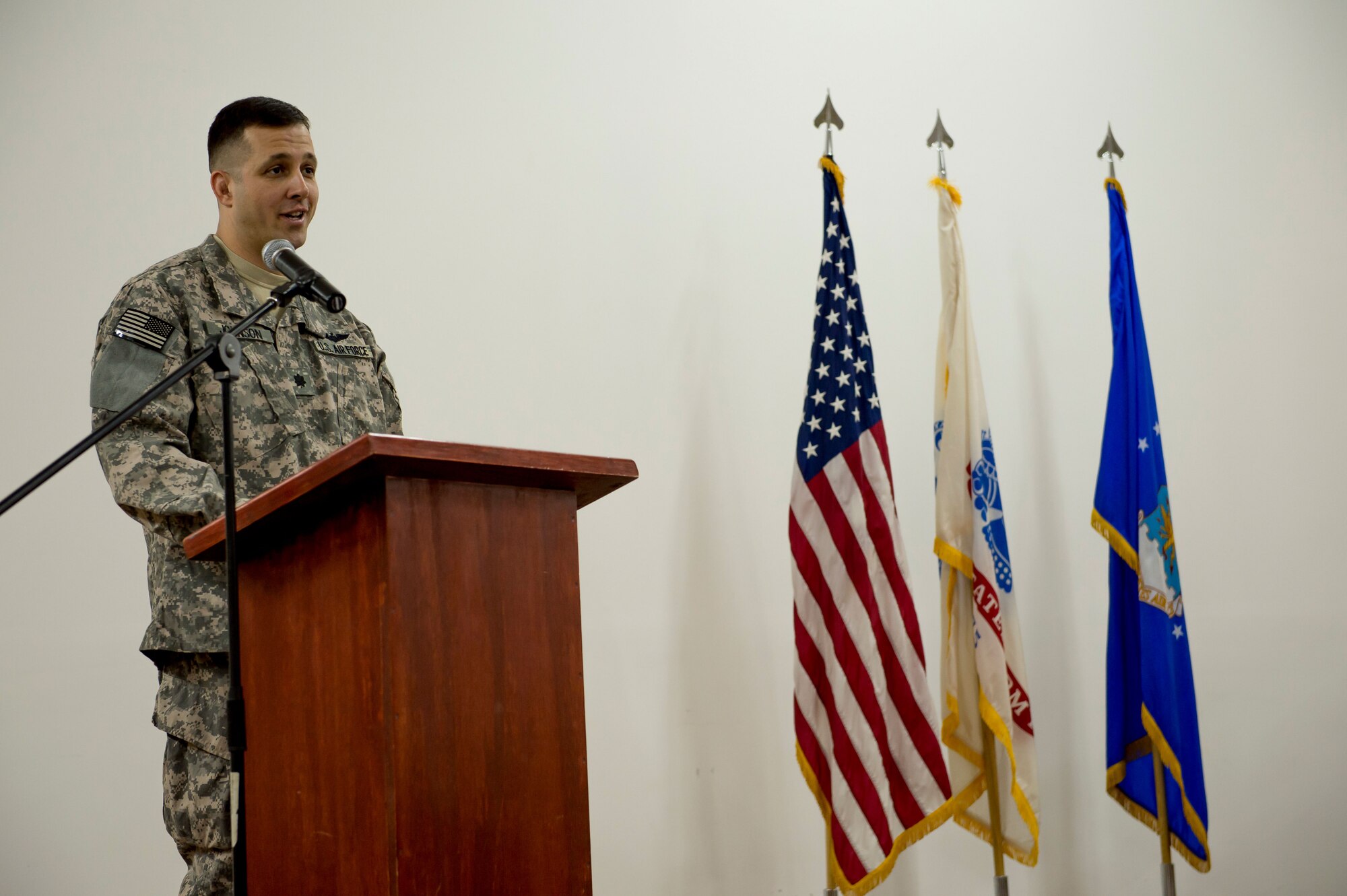 U.S. Air Force Lt. Col Mark Johnson, 82nd Expeditionary Air Support Operations Squadron, speaks to his troops for the first time after assuming command on May 3, 2014 at an undisclosed location is Southwest Asia. The 82nd EASOS provides tactical command and control of air assets and environmental support to the Joint Forces Air and Land Component Commanders.  (U.S. Air Force photo by Staff Sgt. Jeremy Bowcock)