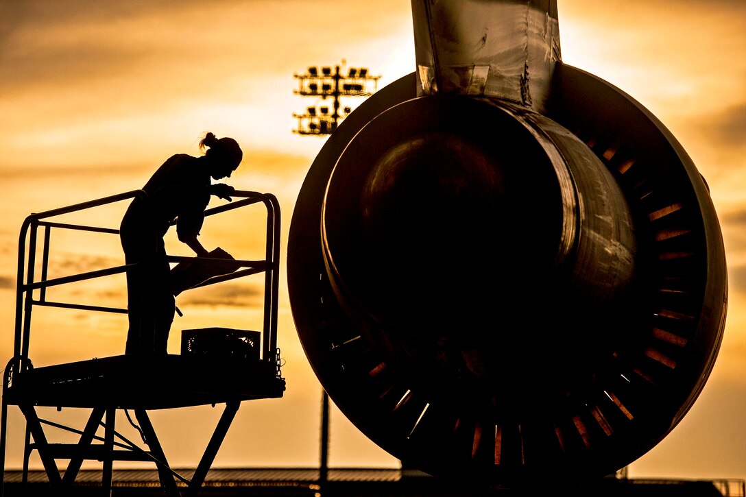 Air Force Tech. Sgt. Laura Moseley performs an engine check on a C-5 Galaxy aircraft after landing on Joint Base Charleston, S.C., July 22, 2013. Moseley, a crew chief, is assigned to the West Virginia Air National Guard's 167th Maintenance Squadron. The C-5 crew loaded cargo to assist with Operation Enduring Freedom.  
