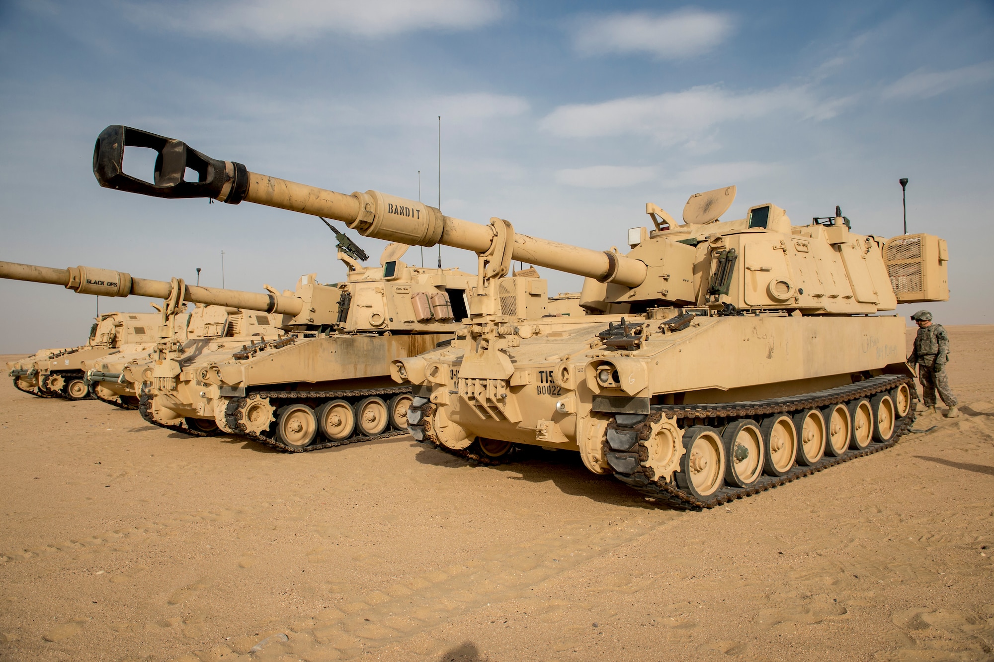A U.S. Army M109A6 Paladins rests after firing during a Joint Operations live fire exercise on May 7, 2014 at an undisclosed location in Southwest Asia. The operation consisted of Army, Air Force, and Navy personnel working together to conduct a coordinated strike against a single target. (U.S. Air Force photo by Staff Sgt. Jeremy Bowcock)