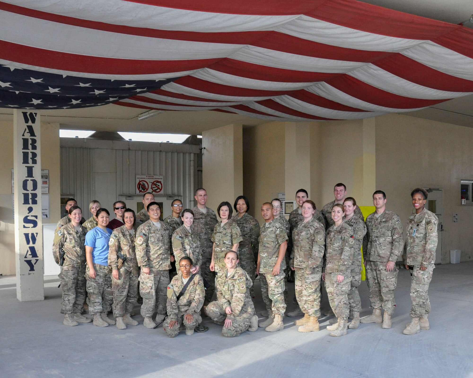BAGRAM AIRFIELD, Afghanistan – Medical personnel assigned to Craig Joint Theater Hospital, Bagram Airfield, Afghanistan gather together May 10, 2014 in celebration of National Nurse and Technician Week. 