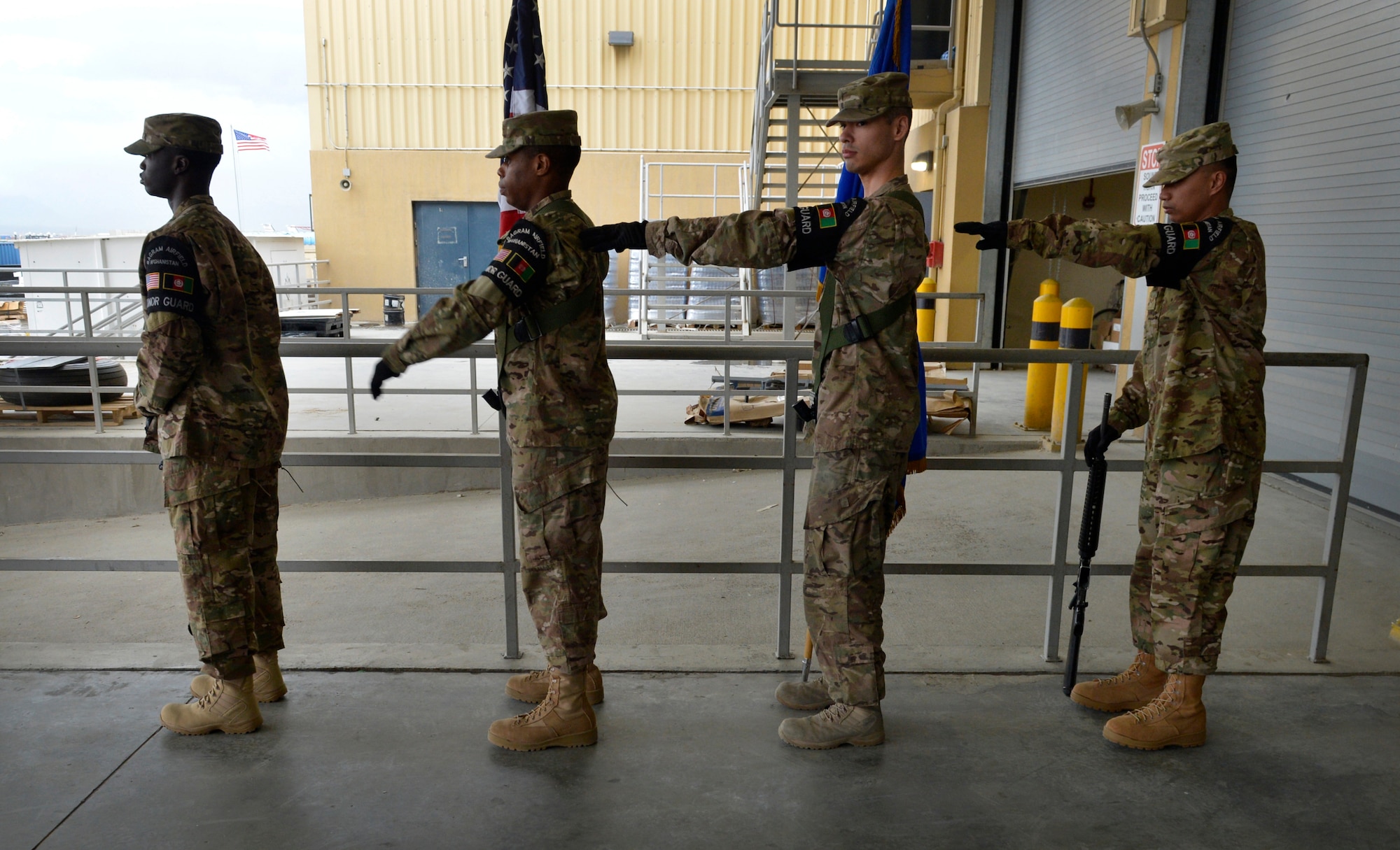 Honor guardsmen from Bagram Airfield, Afghanistan, review their spacing for a Change of Command ceremony May 9, 2014.  The Airmen are part of Bagram’s honor guard.  As honor guardsmen, they must demonstrate dedication, commitment and precision, as well as skillfull excecution of ceremonial drills. (U.S. Air Force by Staff Sgt. Evelyn Chavez/Released)