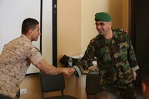 Brig. Gen. Khalil El Jomayyel shakes Sgt. Ahmed Khalil's hand in appreciation for his efforts during an enlisted leadership seminar hosted by the 4th Intervention Regiment in Beirut, Lebanon on March 11, 2014. During the seminar, Marines from Command Element Marine Forces Central Command Forward and soldiers from the 4th Intervention Regiment discussed leadership principles and the role of Non-Commissioned Officers in military units. (U.S. Marine Corps photo by; Sgt James A. Hall, CE MARFOR CENTCOM (FWD) Combat Camera/Released)