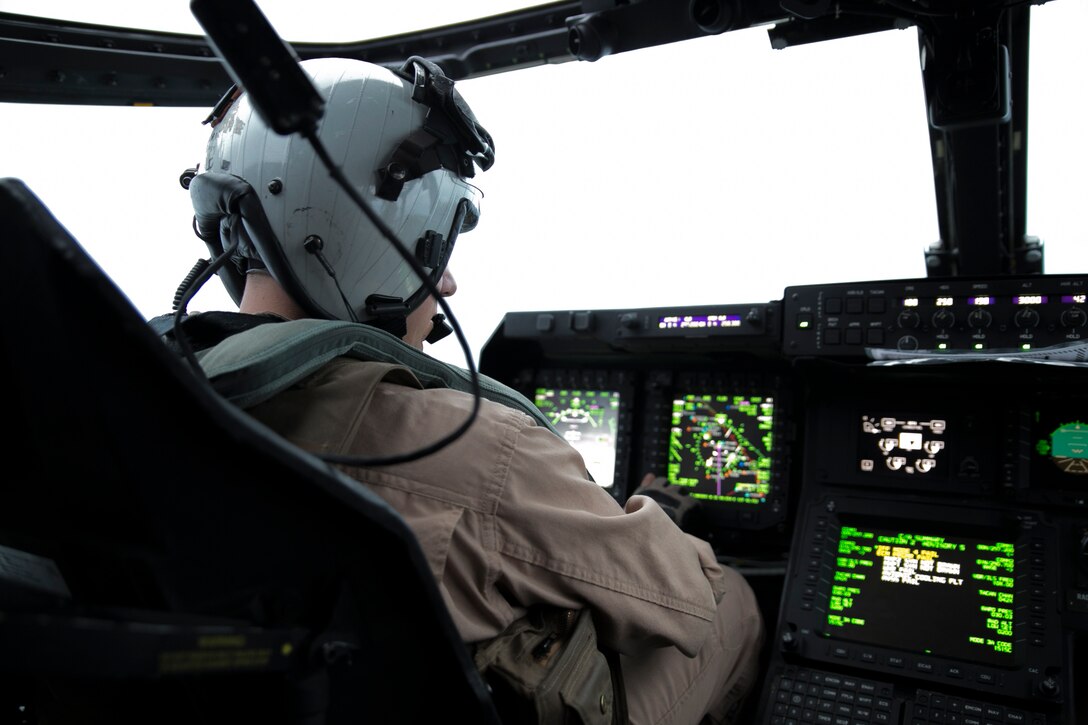 Capt. Ivan C. Morin, a Houston, Texas, native, pilots an MV-22B Osprey tiltrotor aircraft May 6 from Marine Corps Air Station Futenma to Kadena Air Base during routine training. Morin executed confined aerial landings and flight instrument training, which facilitates safety during low visibility flying. Morin is a pilot with Marine Medium Tiltrotor Squadron 265, Marine Aircraft Group 36, 1st Marine Aircraft Wing, III Marine Expeditionary Force.