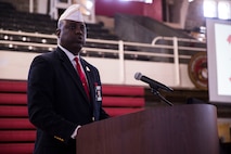 Dr. James Averhart Jr., the national president of the Montford Point Marine Association, speaks during a ceremony unveiling a new logo for 2nd Supply Battalion, 2nd Marine Logistics Group, at Camp Lejeune, N.C., May 6, 2014. Averhart spoke about the unique connection between 2nd Supply Battalion and the Montford Point Marines, who fought segregation while performing vital logistics missions during the Pacific Campaign in World War II.

