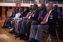 Members of the Montford Point Marine Association sit in attendance during the unveiling ceremony for the new logo of 2nd Supply Battalion, 2nd Marine Logistics Group aboard Camp Lejeune, N.C., May 6, 2014. Approximately 20,000 African-American Marines trained at Montford Point, N.C., when a presidential order allowed them to join the military during World War II.