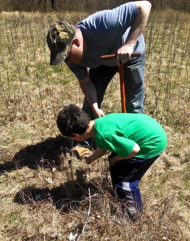 Tionesta Lake Project Staff and 10 of their children, ages eight to15 participated in National Take your Daughters and Sons to Work Day on April 24.
Keeping with this year's theme, Plant a Seed; Grow a Future, the children planted two types of saplings, American Chestnuts and Sawtooth Oaks. 