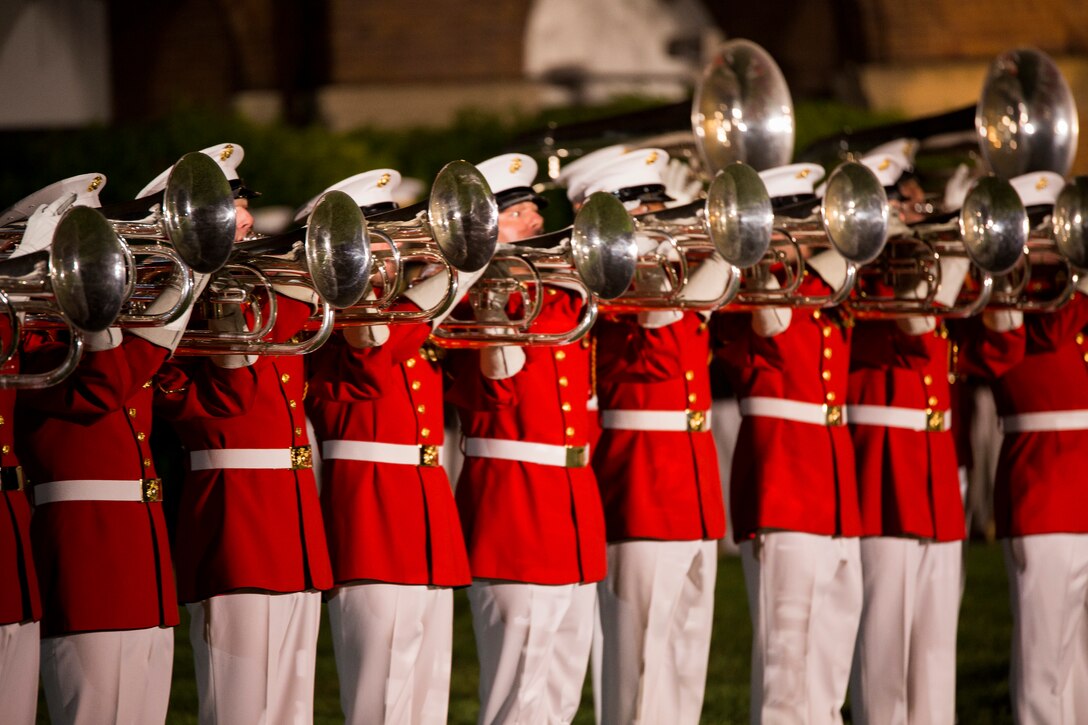The U.S. Marine Drum & Bugle Corps performs for guests during a Friday Evening Parade at Marine Barracks Washington, D.C., May 9, 2014. (Official Marine Corps photo by Cpl. Dan Hosack/Released)