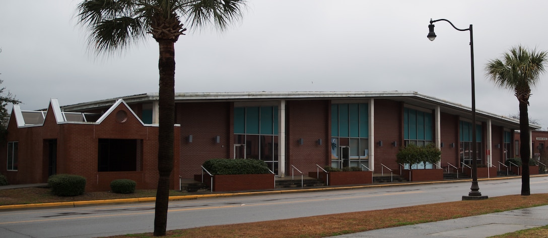 The old Marine exchange building is scheduled for demolition in May 2014, on Parris Island, S.C. The building was built in 1969 and was shut down after the completion of the current Marine Corps Exchange in 2008. In recent years, the building was used as temporary office space. Parris Island’s intent is to eventually transform the site, through a separately funded project, into a park that can be used by visitors and families who travel to here for graduations. (Photo by Cpl. David Bessey)
