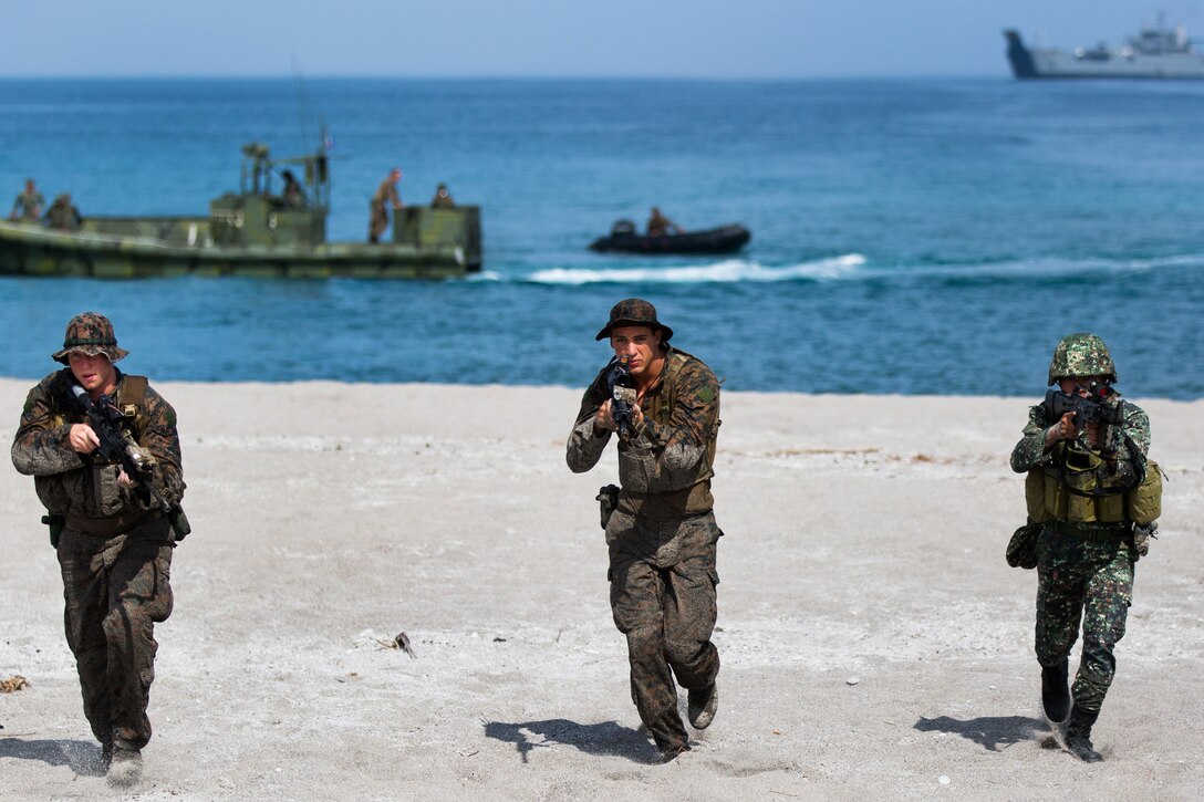 Philippine and U.S. Marines conduct an amphibious landing exercise at the Naval Education and Training Command here May 9. The training evolution, as part of Balikatan 2014, aimed at enhancing interoperability and strengthening the Philippine-U.S. relationship.