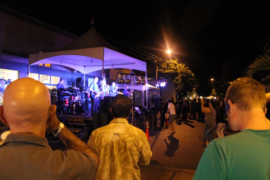WAILUKU, Maui, Hawaii - Hana Hou, the pop/rock group from the United States Air Force Band of the Pacific - Hawaii performs for an enthusiastic crowd in Wailuku for the First Friday street celebration.
(US Air Force Photo/TSgt Michael Smith/Released)