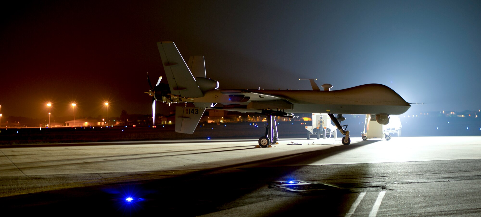 An MQ-9 Reaper sits on the flight line at Hurlburt Field, Fla., April 24, 2014, this was the first year the MQ-9 participated in Emerald Warrior. Emerald Warrior is a U.S. Special Operations Command-sponsored two-week joint/combined tactical exercise designed to provide realistic military training in an urban setting. (U.S. Air Force photo/Staff Sgt. John Bainter)