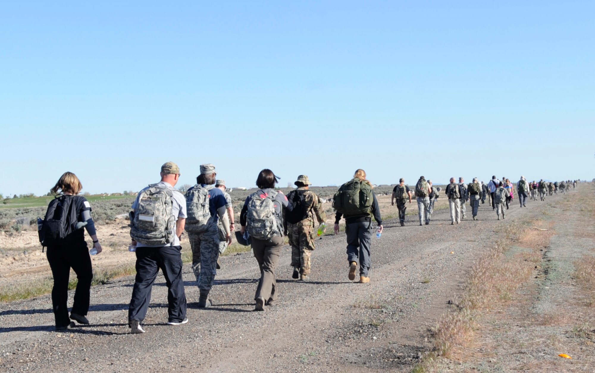 Gunfighters kick off the 2014 National Police Week with a 10K Ruck March to Remember, May 12, 2014, at Mountain Home Air Force Base, Idaho. During the week’s events, gunfighters recognize the bravery and sacrifice that state, local and military police officers make every day. (U.S. Air Force photo by Senior Airman Caitlin Guinazu/Released)
