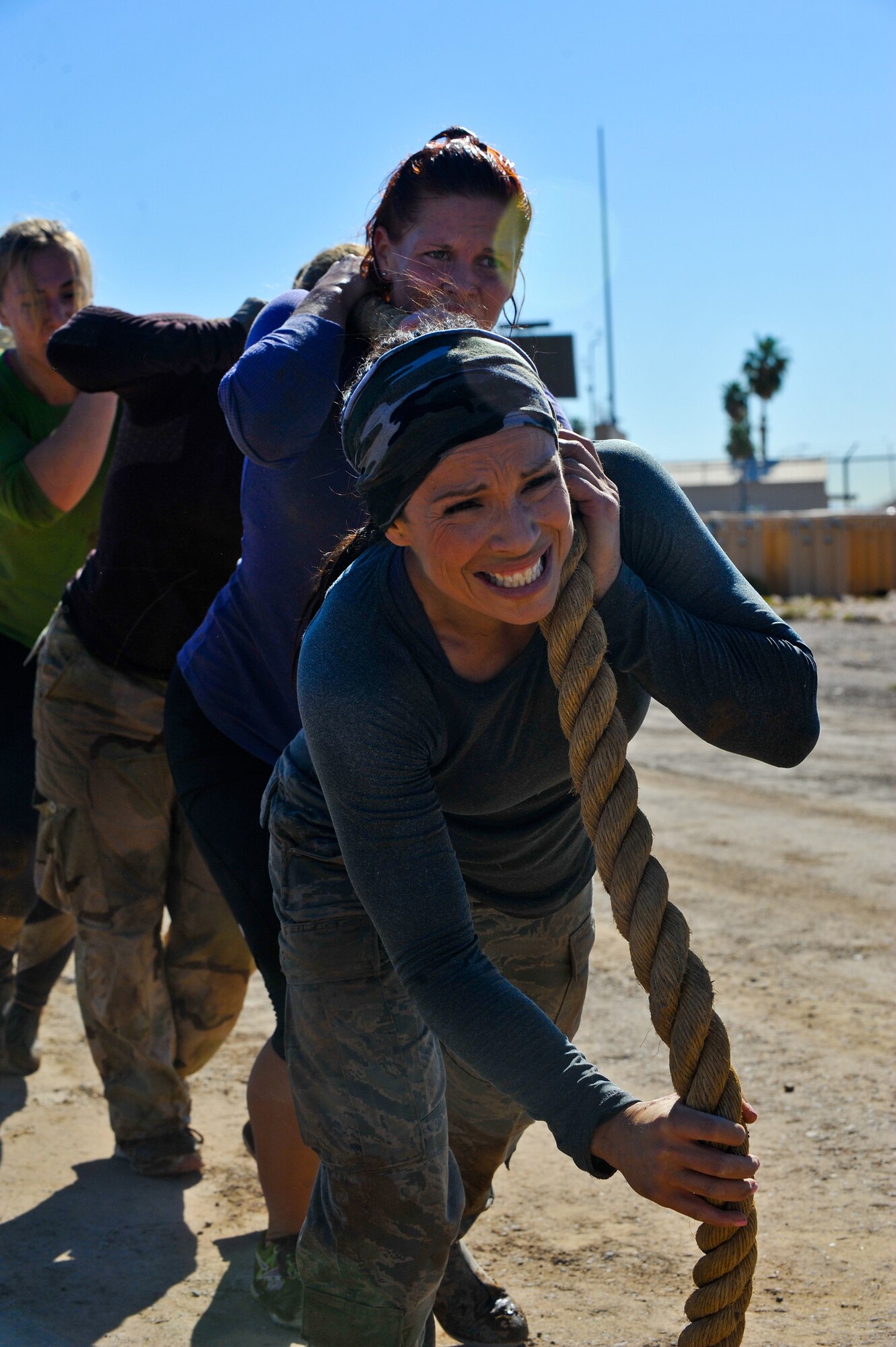 Team CrossFit 623 members pull a Humvee during the challenge. (U.S. Air Force photo/Senior Airman Jason Colbert)