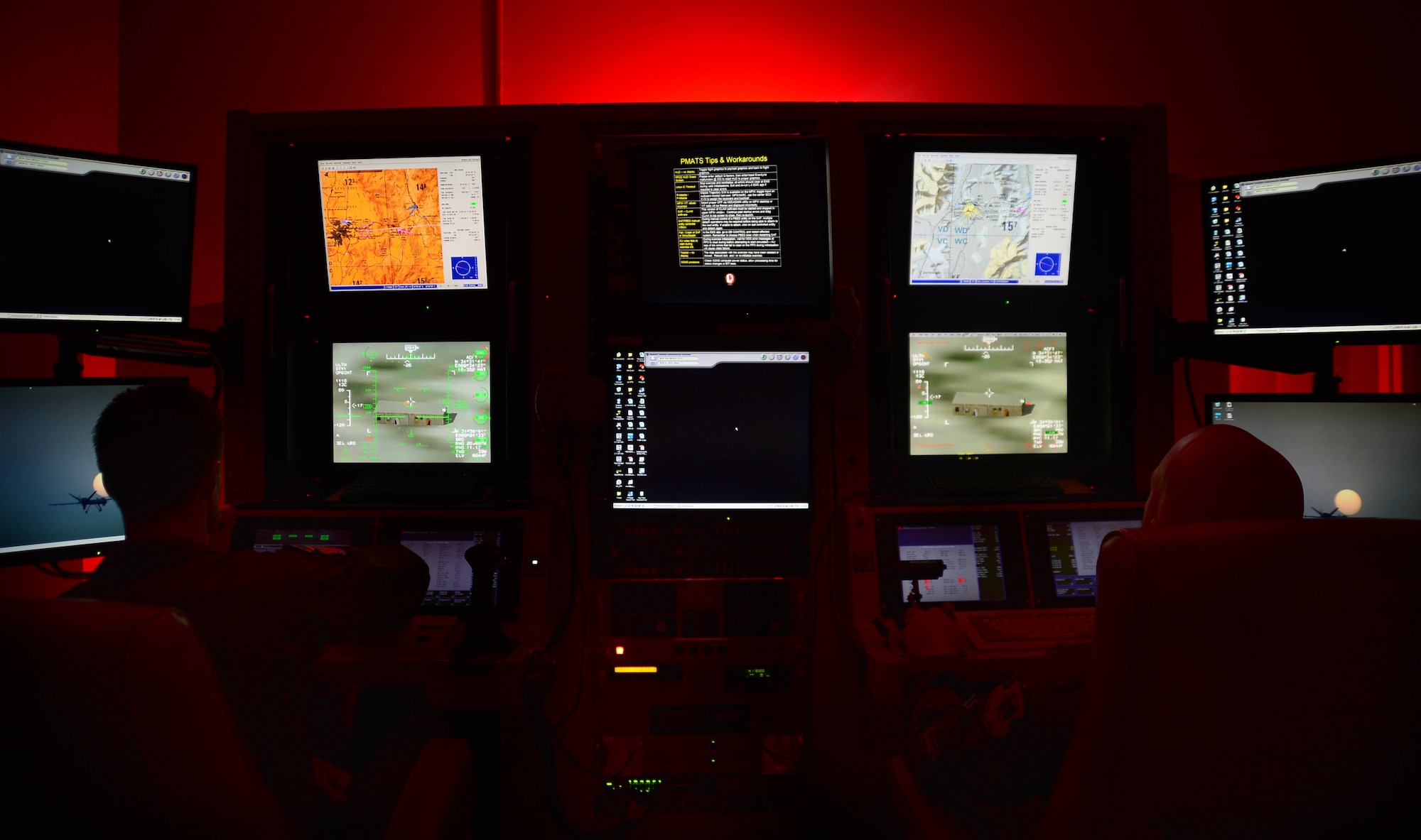 A 91st Attack Squadron remotely piloted aircraft crew prepares to fly a simulated training mission on an MQ-9 Reaper at Creech Air Force Base, Nev., May 8, 2014. The 91st ATKS was recently awarded the 2013 Grover Loening Trophy for exceptional aeronautical skills and for its emphasis on academics, community involvement, comprehensive safety, and professionalism. (U.S. Air Force photo by Staff Sgt. N.B./Released)