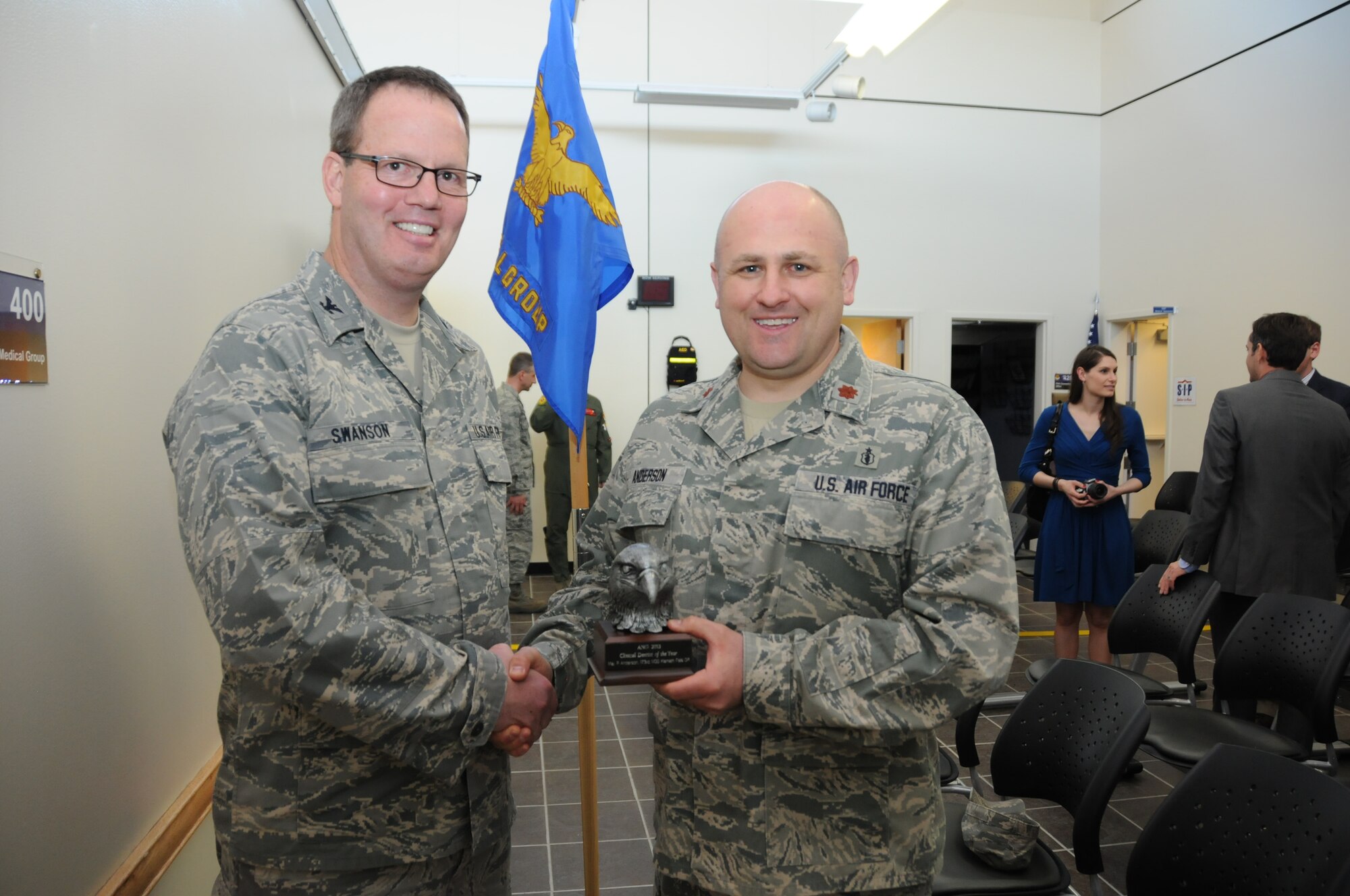 Maj. Paul Anderson, a 173rd Fighter Wing Dentist, accepts his award for top clinical dentist in the entire Air National Guard, April 6, 2014, at Kingsley Field, Ore. Anderson distinguished himself through a number of achievements including averaging 93-percent readiness across the board at Kingsley Field, and contributing to the wing’s top medical readiness statistics in 2013. (U.S. Air Force photo by Tech. Sgt. Jefferson Thompson/released)

