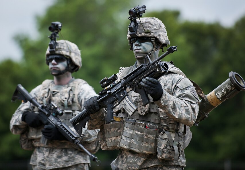 A Ranger team member steps forward during a demonstration at the 6th Ranger Training Battalion’s Open House event May 10 at Eglin Air Force Base, Fla.  The event was a chance for the public to learn how Rangers train and operate. The event displays showed equipment, weapons, a reptile zoo, face painting and weapon firing among others. The demonstrations showed off hand-to-hand combat, a parachute jump, snake show, and Rangers in action.  (U.S. Air Force photo/Tech. Sgt. Sam King)