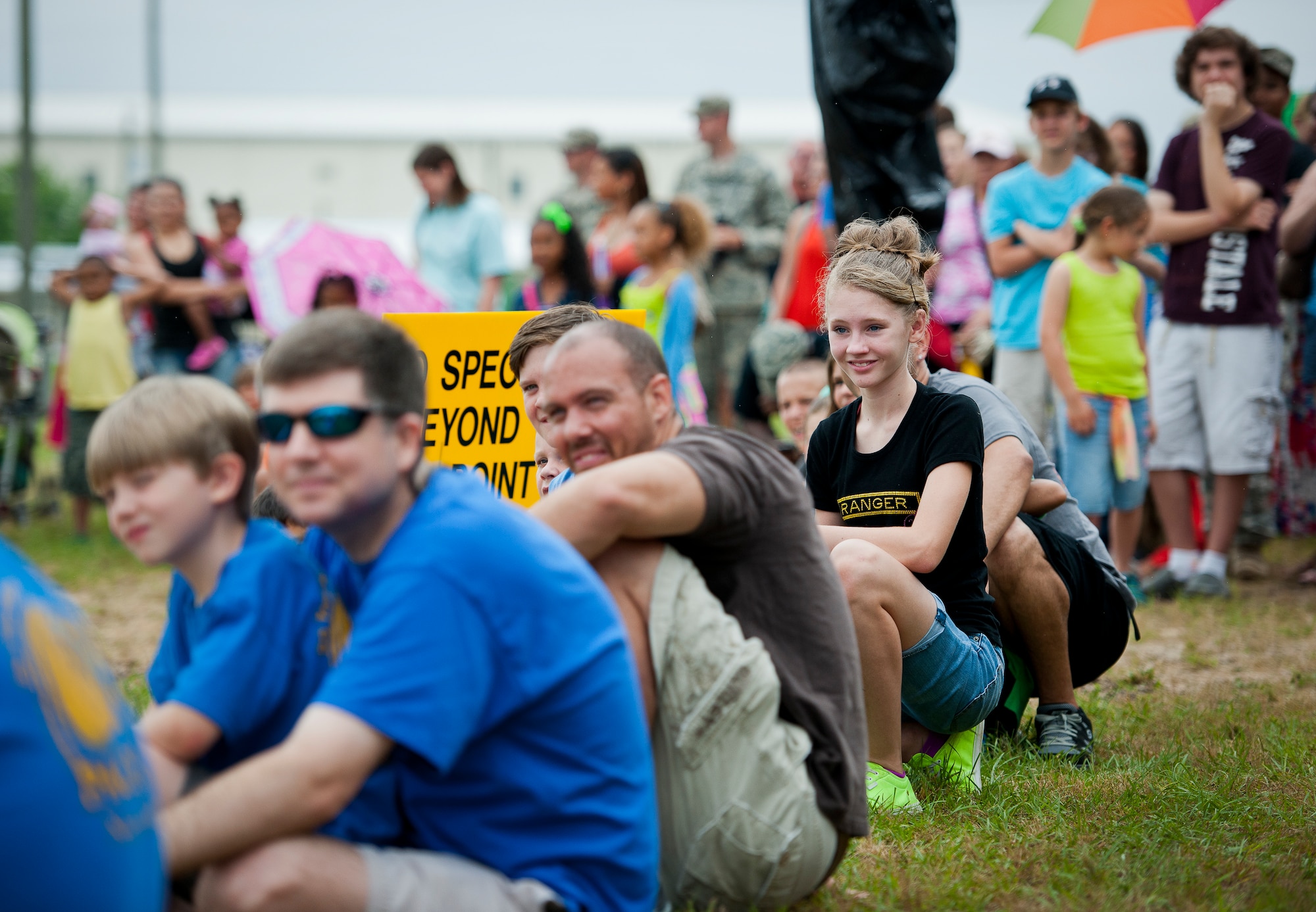 Sarah Spayd, age 12, watches a demonstration with the audience at the 6th Ranger Training Battalion’s Open House event May 10 at Eglin Air Force Base, Fla.  The event was a chance for the public to learn how Rangers train and operate. The event displays showed equipment, weapons, a reptile zoo, face painting and weapon firing among others. The demonstrations showed off hand-to-hand combat, a parachute jump, snake show, and Rangers in action.  (U.S. Air Force photo/Tech. Sgt. Sam King)