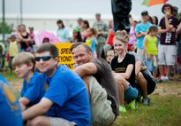 Sarah Spayd, age 12, watches a demonstration with the audience at the 6th Ranger Training Battalion’s Open House event May 10 at Eglin Air Force Base, Fla.  The event was a chance for the public to learn how Rangers train and operate. The event displays showed equipment, weapons, a reptile zoo, face painting and weapon firing among others. The demonstrations showed off hand-to-hand combat, a parachute jump, snake show, and Rangers in action.  (U.S. Air Force photo/Tech. Sgt. Sam King)