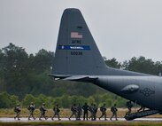 Soldiers from the 6th Ranger Training Battalion board a 908th Airlift Wing C-130 Hercules prior to takeoff May 10 at Eglin Air Force Base, Fla.  The Rangers hitched a ride with the reserve aircrew only to jump out of the back of the aircraft as part of the 6th RTB’s Open House activities.  (U.S. Air Force photo/Tech. Sgt. Sam King)