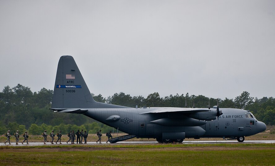 Soldiers from the 6th Ranger Training Battalion board a 908th Airlift Wing C-130 Hercules prior to takeoff May 10 at Eglin Air Force Base, Fla.  The Rangers hitched a ride with the reserve aircrew only to jump out of the back of the aircraft as part of the 6th RTB’s Open House activities.  (U.S. Air Force photo/Tech. Sgt. Sam King)