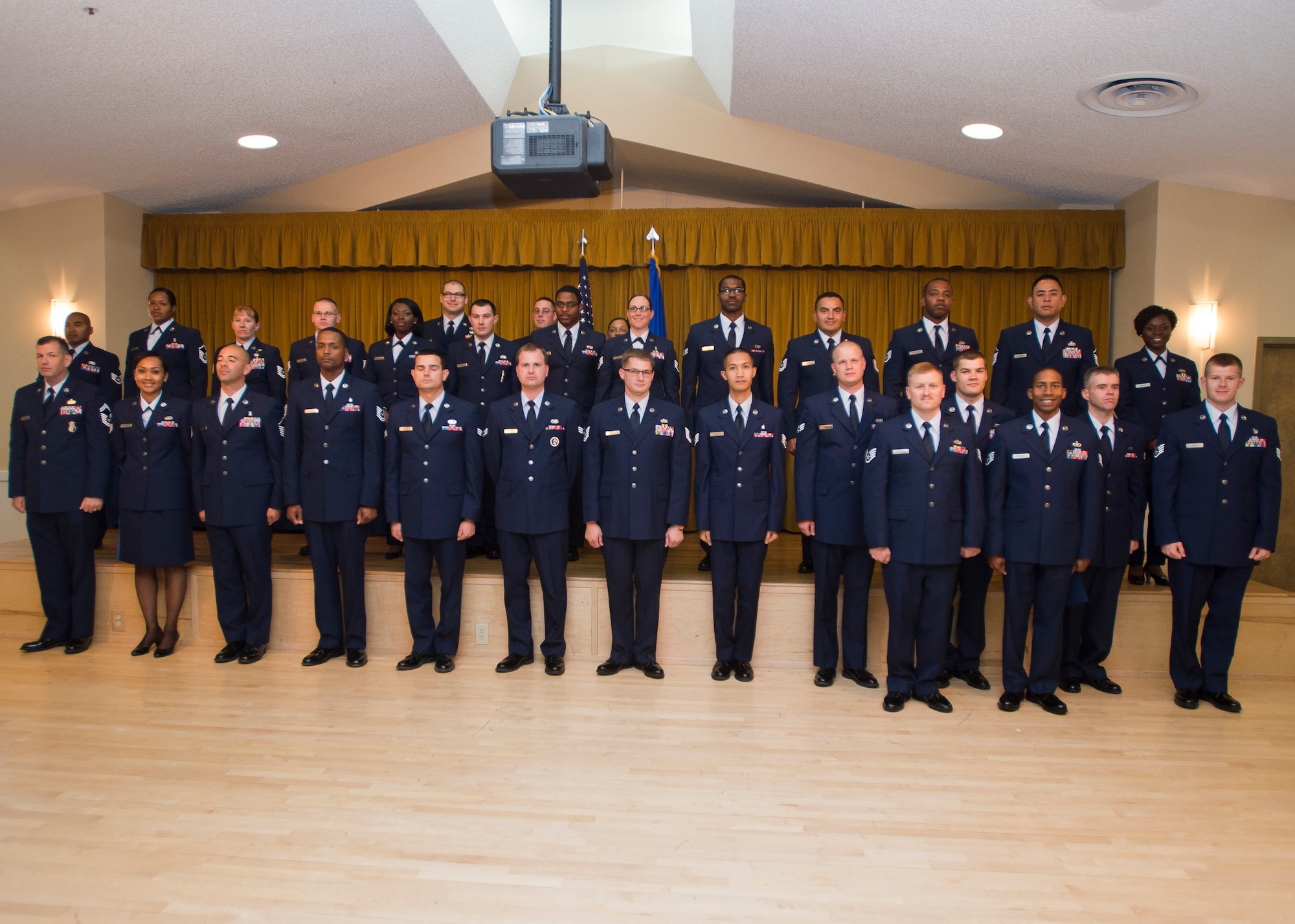 2014 Graduates of the Community College of the Air Force and private colleges celebrated their higher education achievements with a ceremony May 7 at Club Muroc. (U.S. Air Force photo by Ethan Wagner)