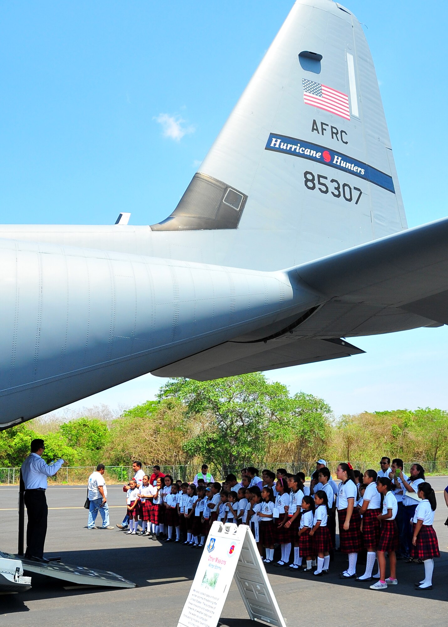 Children from a local elementary school in Huatulco, Mexico, tour the WC-130J May 7, 2014, during the Caribbean Hurricane Awareness Tour. The CHAT, a joint effort between National Oceanic and Atmospheric Administration's National Hurricane Center and the 403rd Wing's 53rd Weather Reconnaissance Squadron, promotes hurricane awareness and preparedness throughout the Caribbean region. More than 4,000 people attended the tour May 4-11, 2014, at Manzanillo, Zihuatanejo and Huatulco, Mexico, St. Vincent, and San Juan, Puerto Rico. (U.S. Air Force photo/Maj. Marnee A.C. Losurdo)