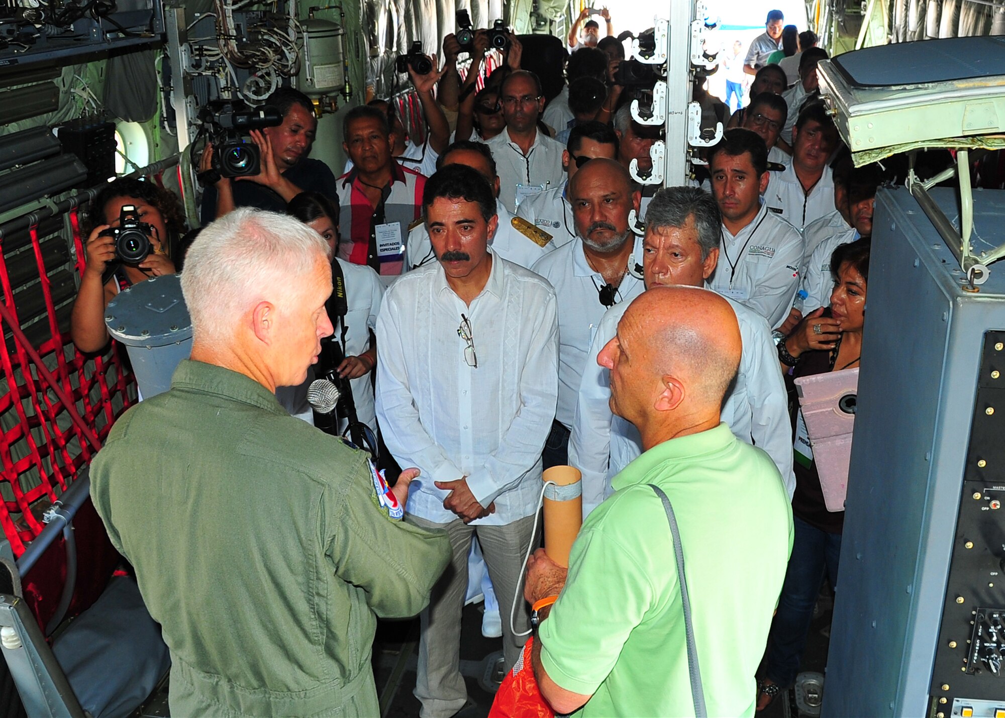 Lt. Col. Jon Talbot, Lt. Col. Jon Talbot, 53rd Weather Reconnaissance
Squadron chief meteorologist, and Dr. Lixion Avila, National Hurricane
Center senior hurricane specialist, brief Mexican dignitaries and media in
Zihuatanejo, Mexico, May 7, 2014, during the Caribbean Hurricane Awareness Tour. The outreach program, which began in the 1970's and is a joint effort between National Oceanic and Atmospheric Administration's National Hurricane Center and the 403rd Wing's 53rd Weather Reconnaissance Squadron, promotes hurricane awareness and preparedness throughout the Caribbean region. (U.S. Air Force photo/Maj. Marnee A.C. Losurdo)
