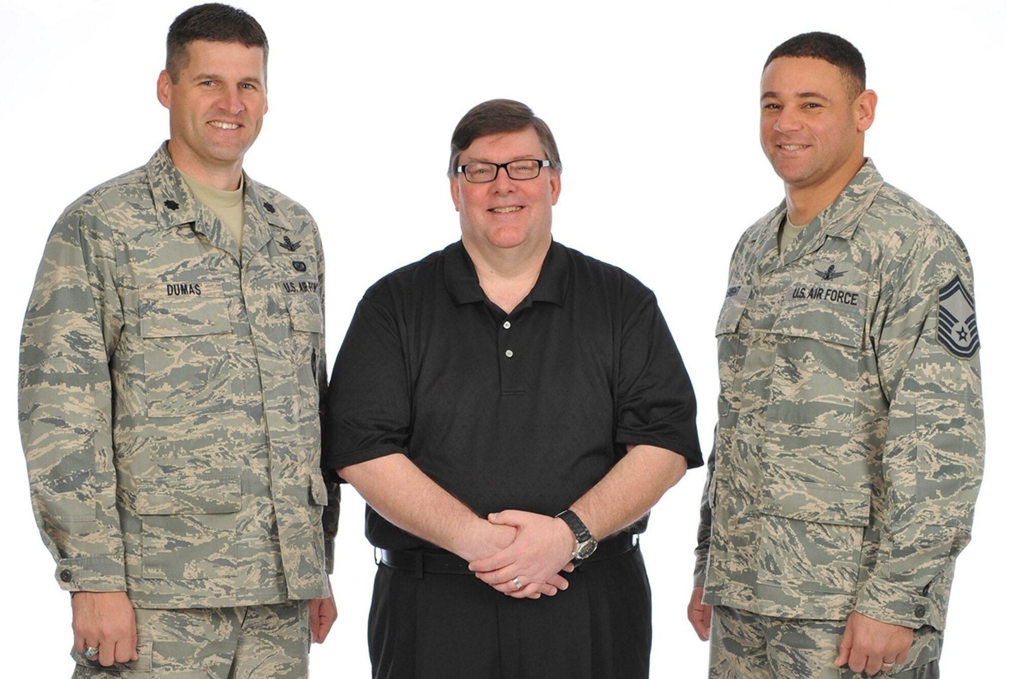 Lt. Col. Craig Dumas, Edward Boywid, and Senior Master Sgt. Omar Basnight, of the 45th Space Wing Inspector General Team, were recently awarded the Air Force Space Command 2013 Lt. Gen. John P. Flynn Award—Installation-level. The award recognizes the IG Complaints Resolution program office that embodies the six fundamental characteristics of Flynn's Leadership model: Integrity, Justice, Compassion, Loyalty, Courage and Spirit. Patrick’s IG team now moves on to compete at the Air Force level. Master Sgt. Corine Collie was not available for photo. (U.S. Air Force photo illustration/Matthew Jurgens)