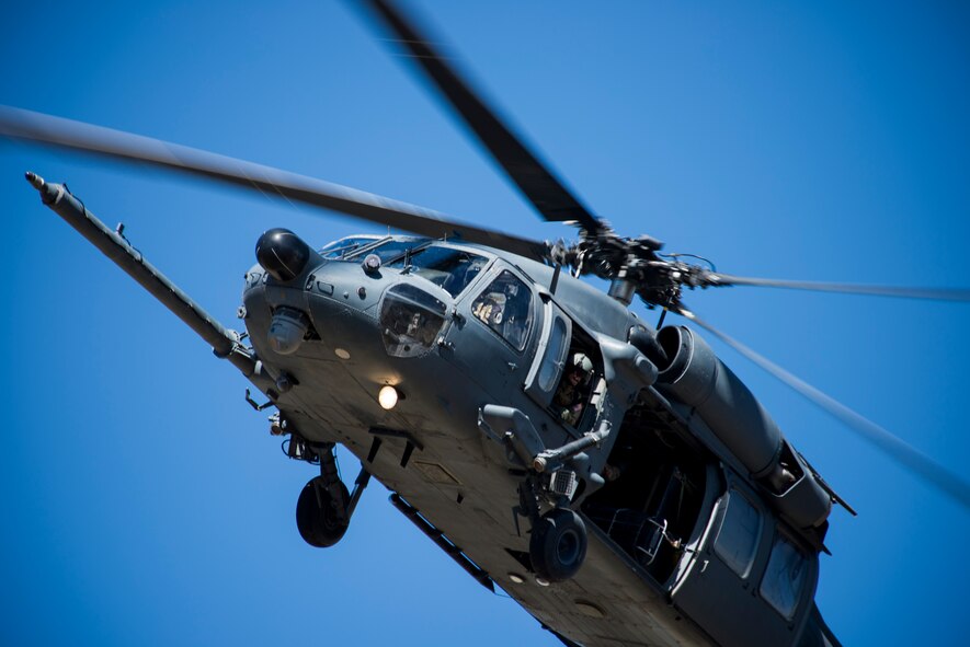 An HH-60G Pave Hawk from the 41st Rescue Squadron out of Moody Air Force Base, Ga., maneuvers through the sky during an Angel Thunder mass-casualty exercise May 9, 2014, at Camp Navajo, Ariz. The rescue unit used the HH-60 to transport injured personnel to receive further medical care. (U.S. Air Force photo by Staff Sgt. Jamal D. Sutter/Released) 
