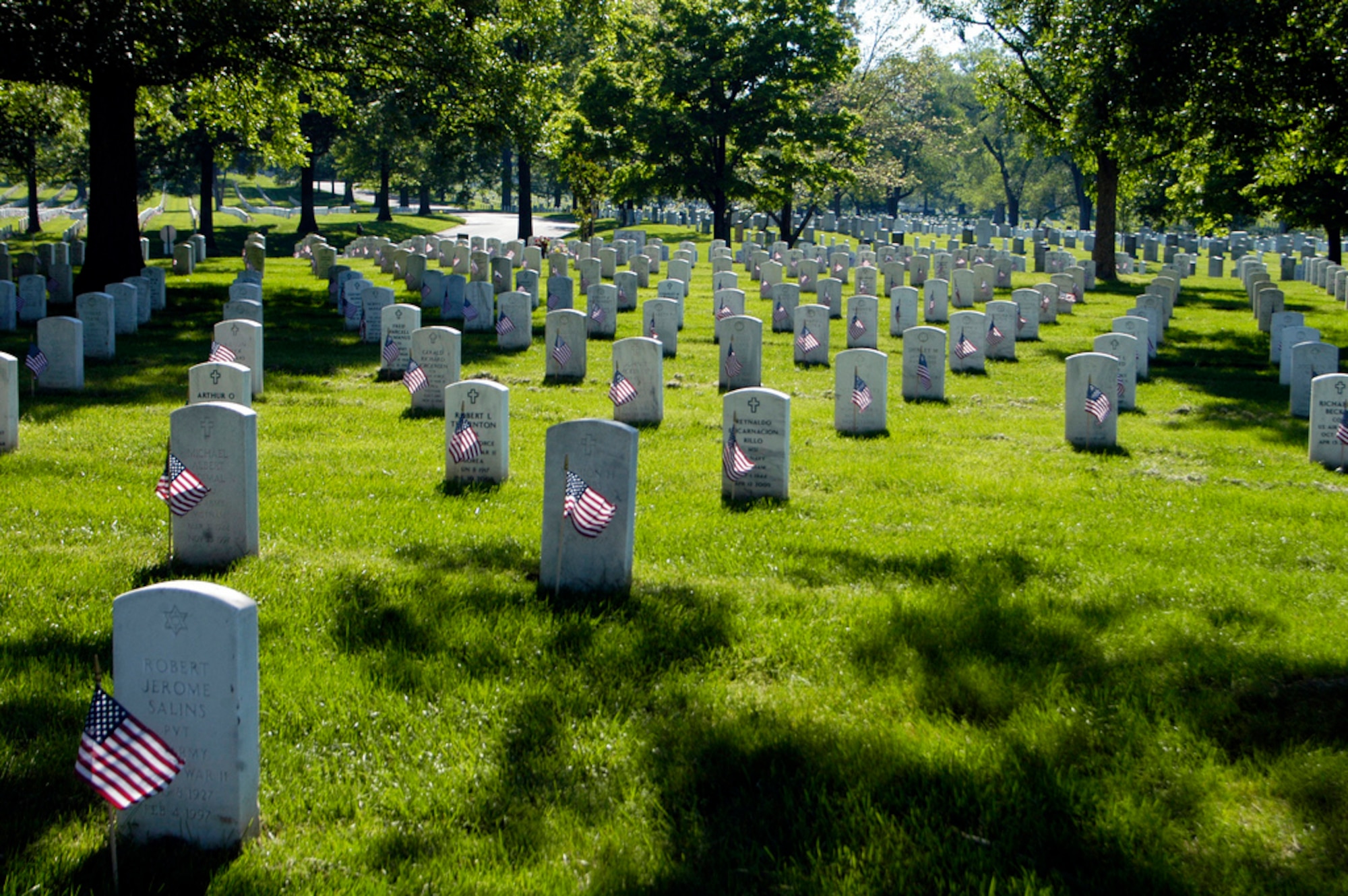 Flags are placed on the grave sites of veterans from Iraq and Afghanistan every Memorial Day. Memorial Day, May 28, 2014, falls in the period of Arlington National Cemetery's sesquicentennial celebrations. (U.S. Army photo)